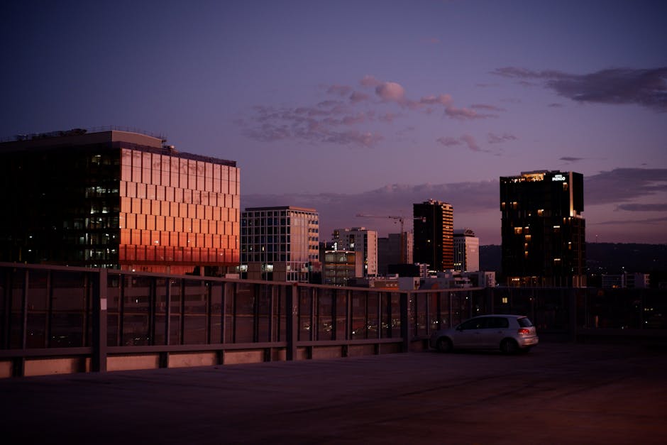 Beautiful twilight view of Adelaide skyline with modern buildings reflecting sunset hues / Pexels