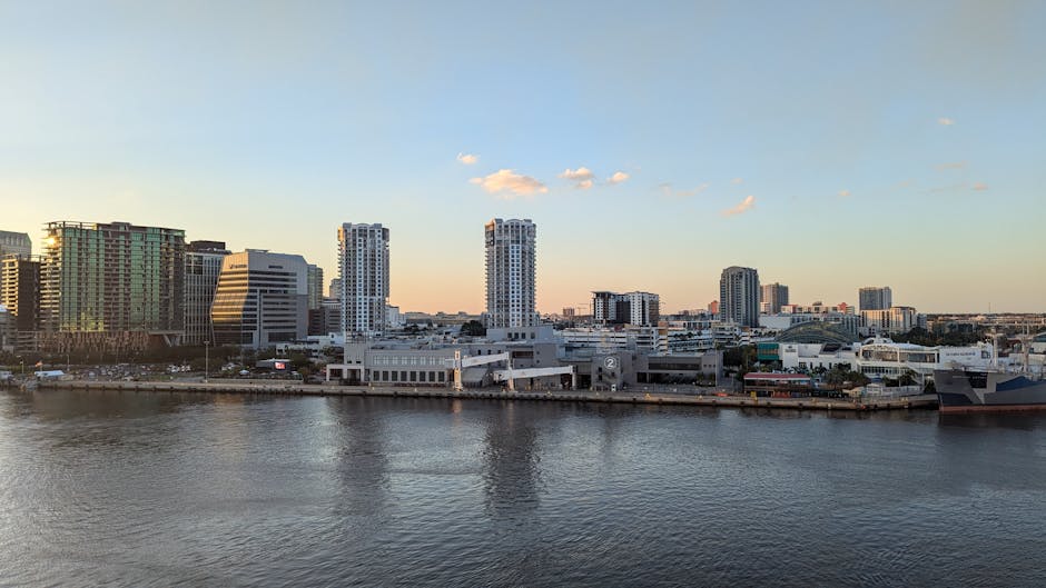 Tampa Bay skyline at dusk reflecting on calm waters, Tampa Florida