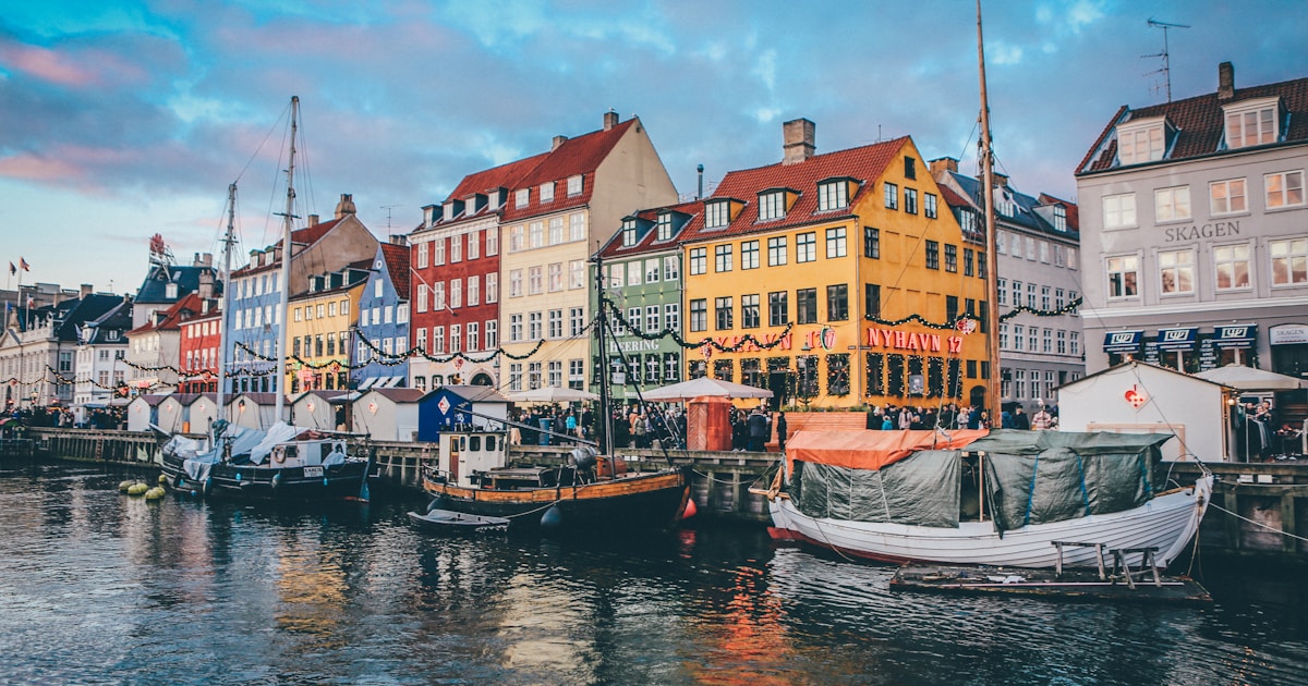 Colourful houses along Nyhavn harbour in Copenhagen, Denmark