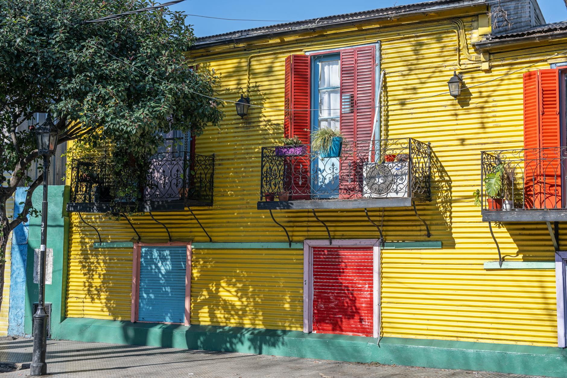 Buenos Aires, Argentina — Brightly painted La Boca house with colorful shutters in Buenos Aires, Argentina.
