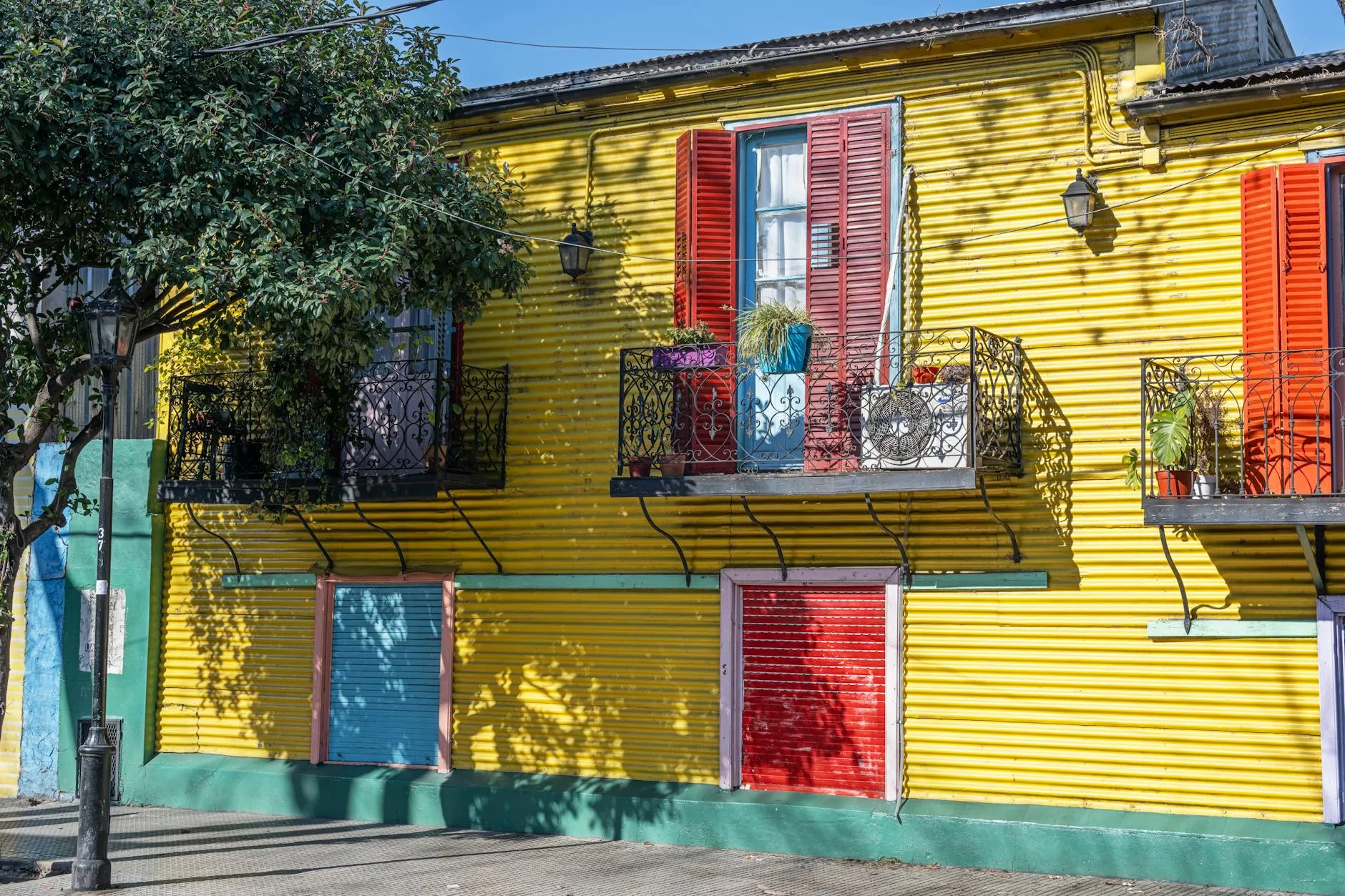 Buenos Aires, Argentina — Brightly painted La Boca house with colorful shutters in Buenos Aires, Argentina.