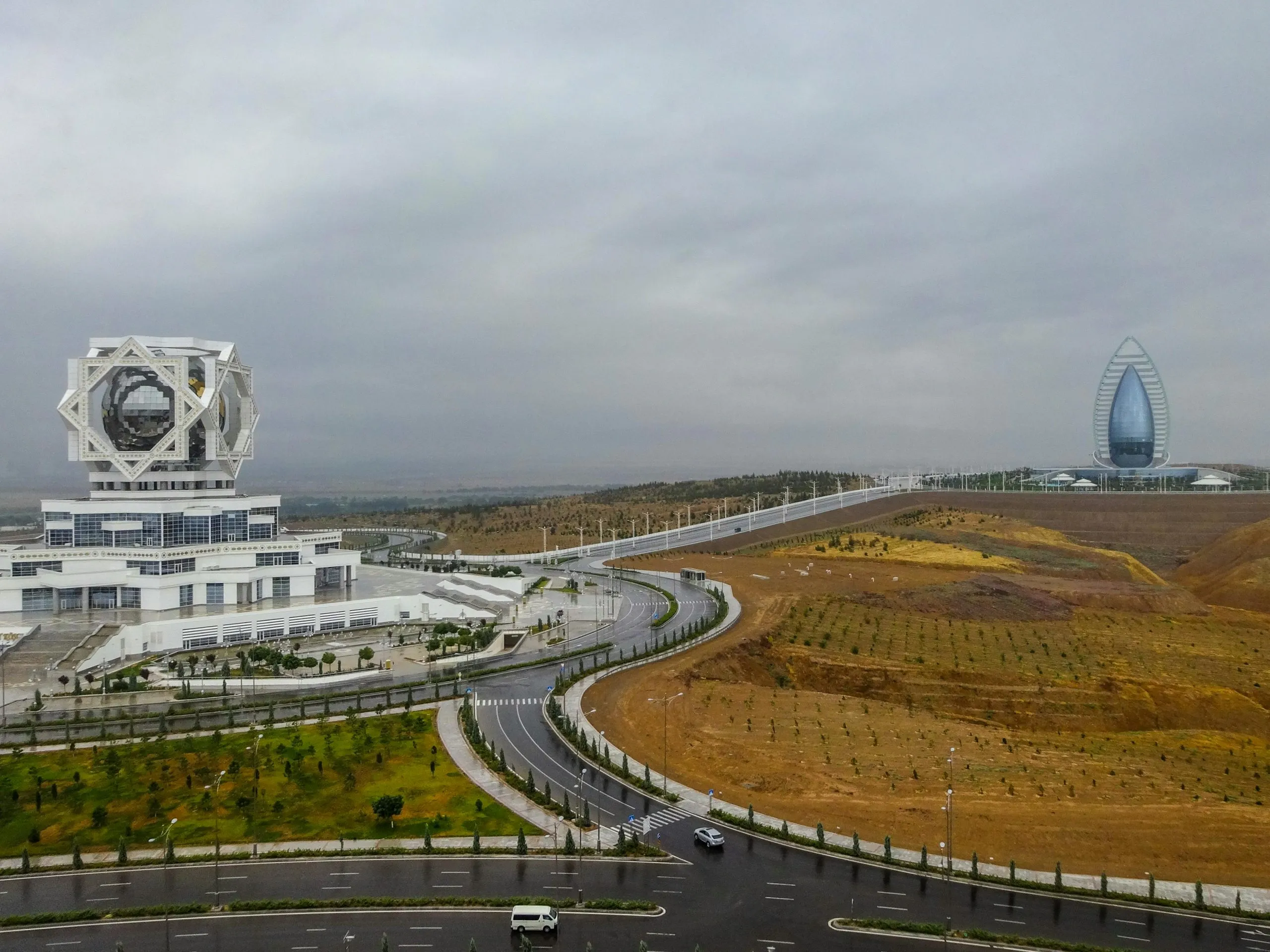 Aerial view of Wedding Palace and Yyldyz Hotel, Ashgabat — flight deal hero