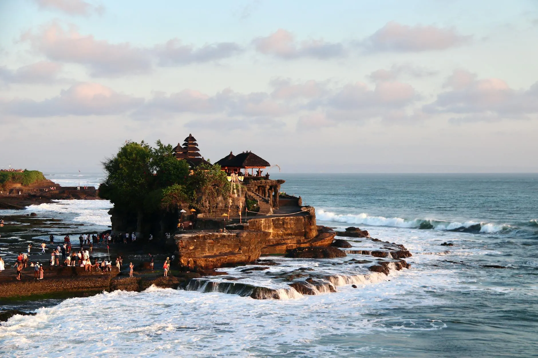 Bali Indonesia — scenic aerial view of the iconic tanah lot temple on the coast of bali, surround
