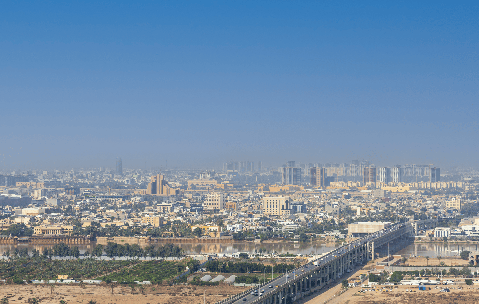 Baghdad, Iraq — Breathtaking aerial view of Baghdad cityscape with Tigris River, showcasing urban architecture.