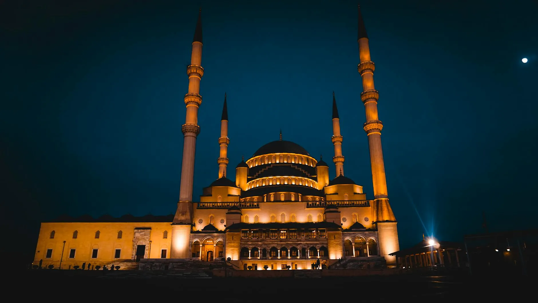 Ankara, Türkiye — A stunning view of Kocatepe Mosque brightly illuminated against a nighttime sky in Ankara, Turkey.