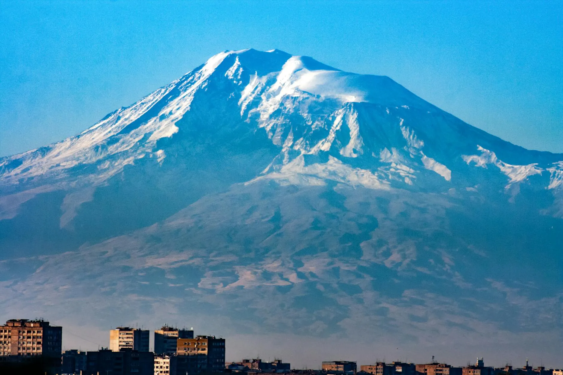 Yerevan Armenia — Stunning view of Mount Ararat covered in snow, towering over Yerevan cityscape in Armenia.