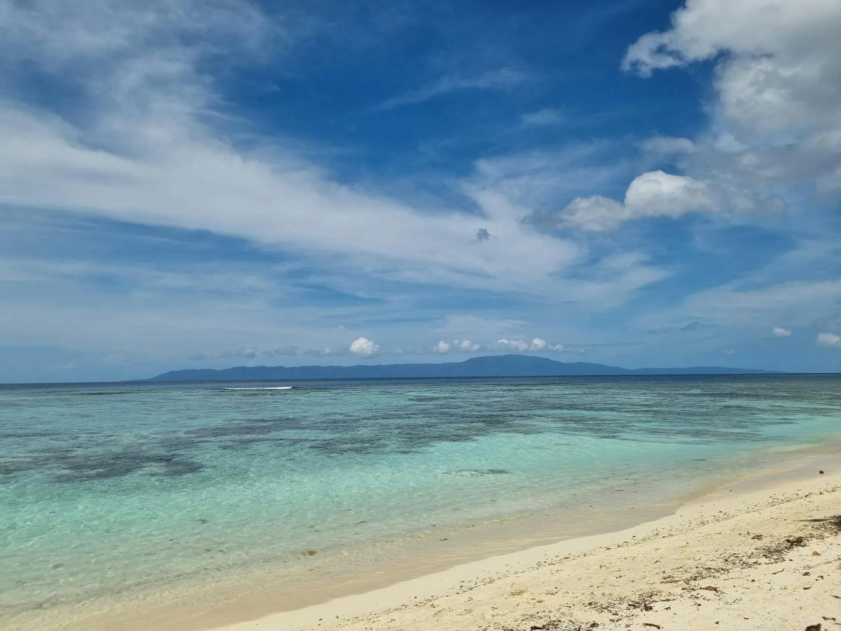 Honiara, Solomon Islands — Explore the tranquil beach of Gizo, Solomon Islands with clear waters and sandy shores.