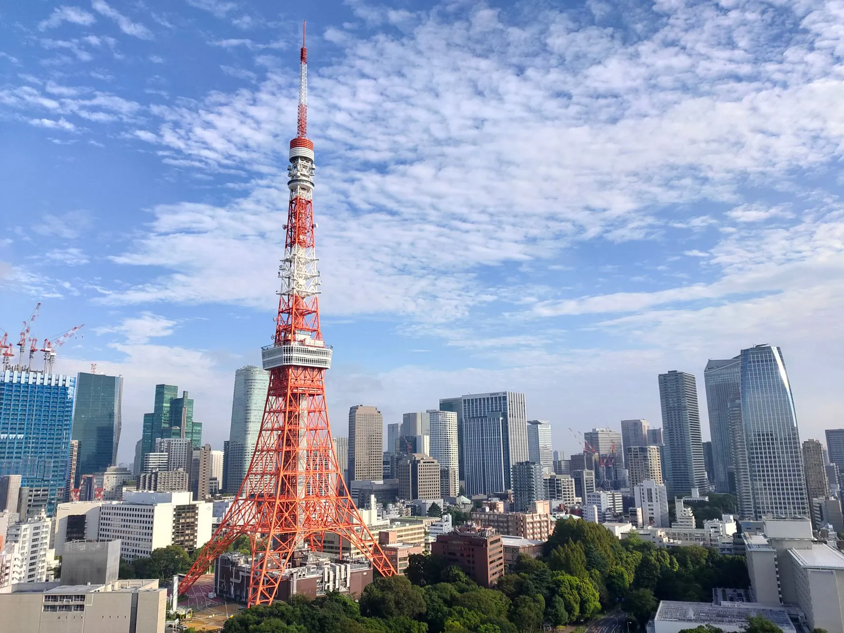Tokyo, Japan — A stunning aerial view of Tokyo Tower amidst the vibrant cityscape of Tokyo, Japan.