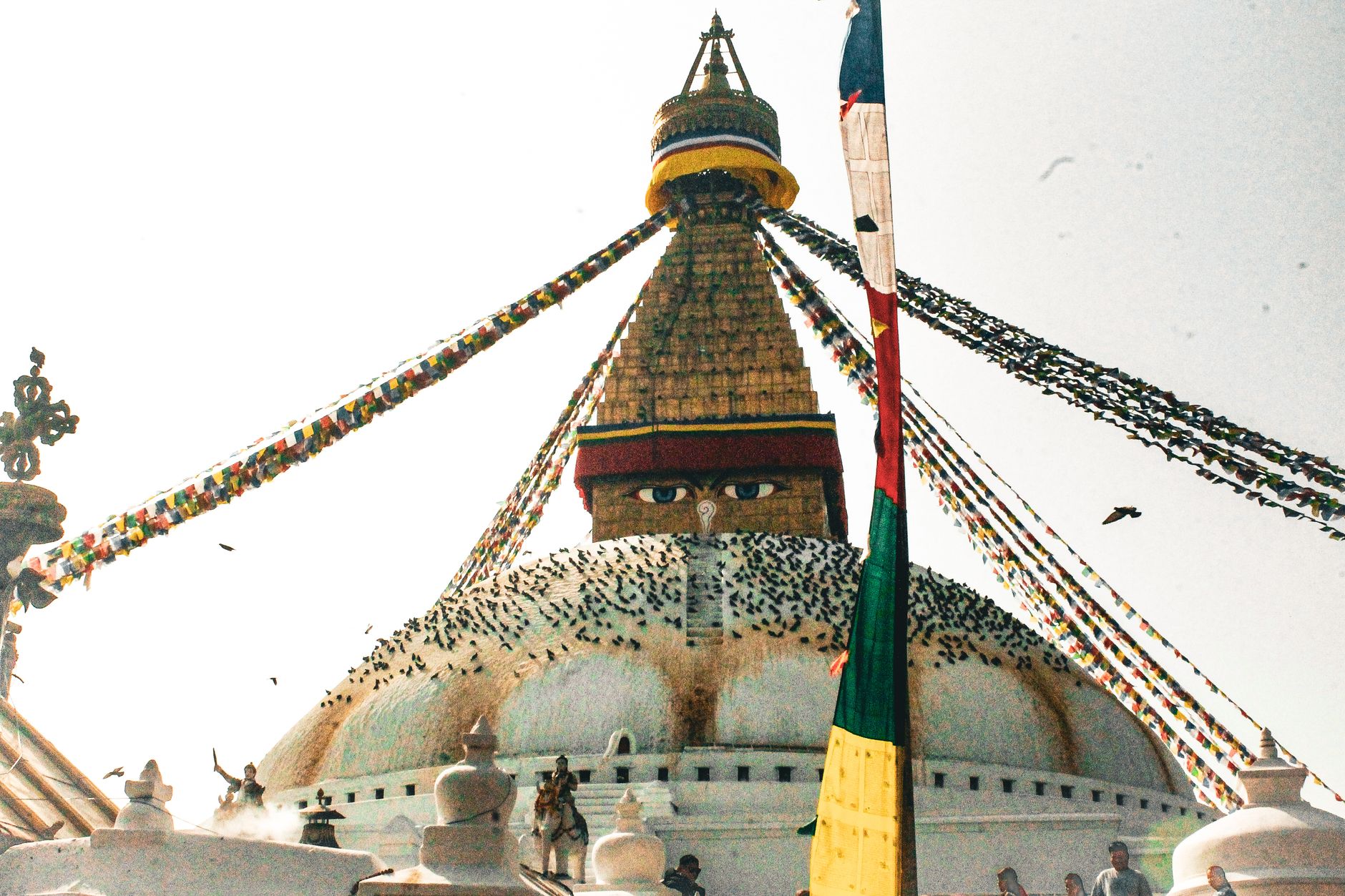 Kathmandu Nepal — Boudhanath Stupa with colorful prayer flags under clear sky in Kathmandu, Nepal.