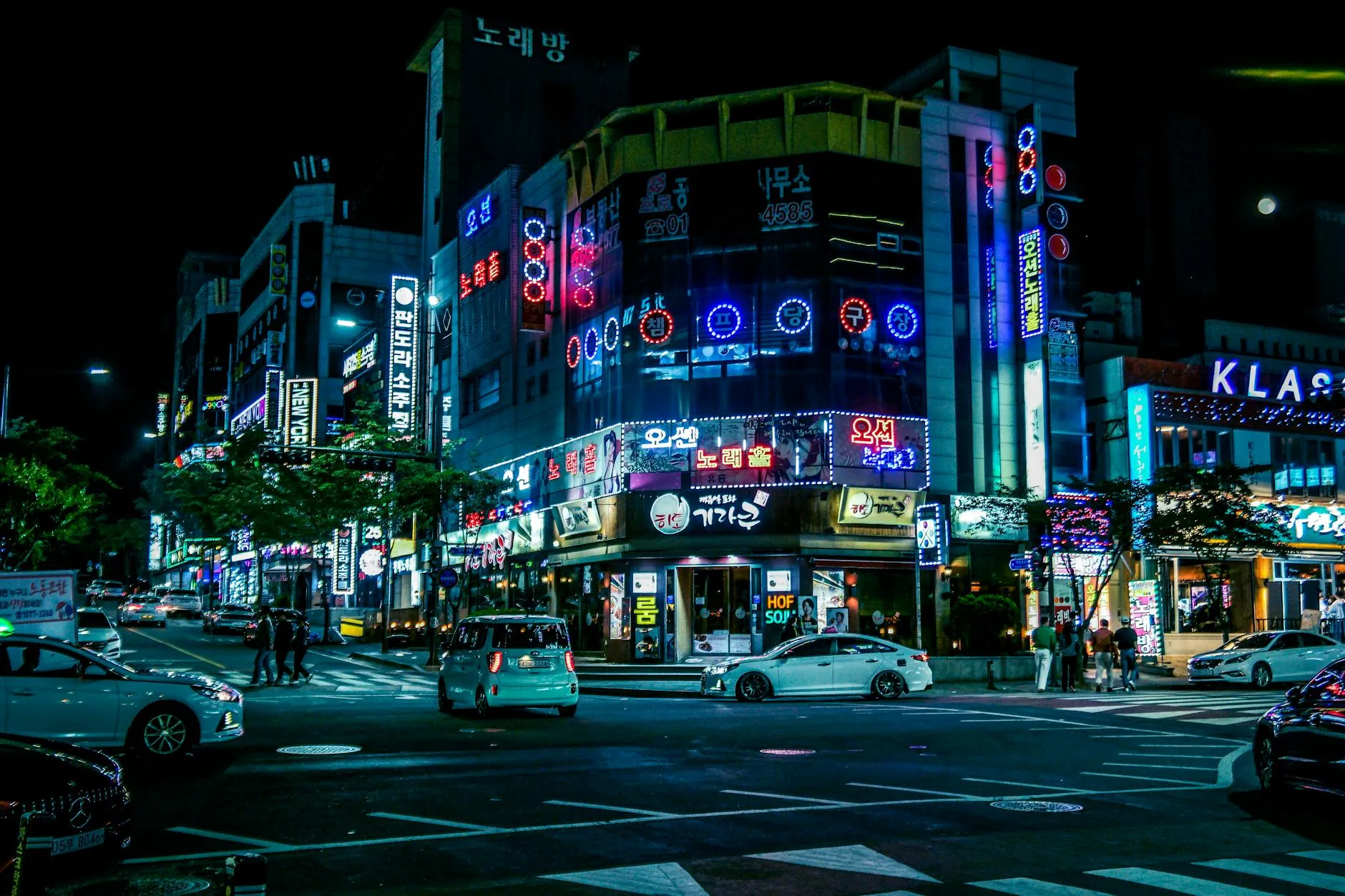 Gwangju, South Korea — Illuminated street in Gwangju, South Korea, showcasing neon lights and city hustle at night.