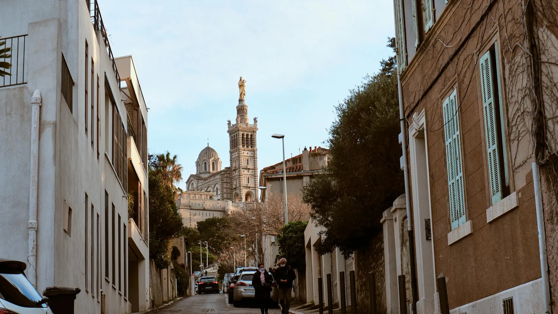 Marseille Provence Airport (MRS) — Captivating street scene with Notre-Dame de la Garde in Marseille, France, showcasing historical architecture.