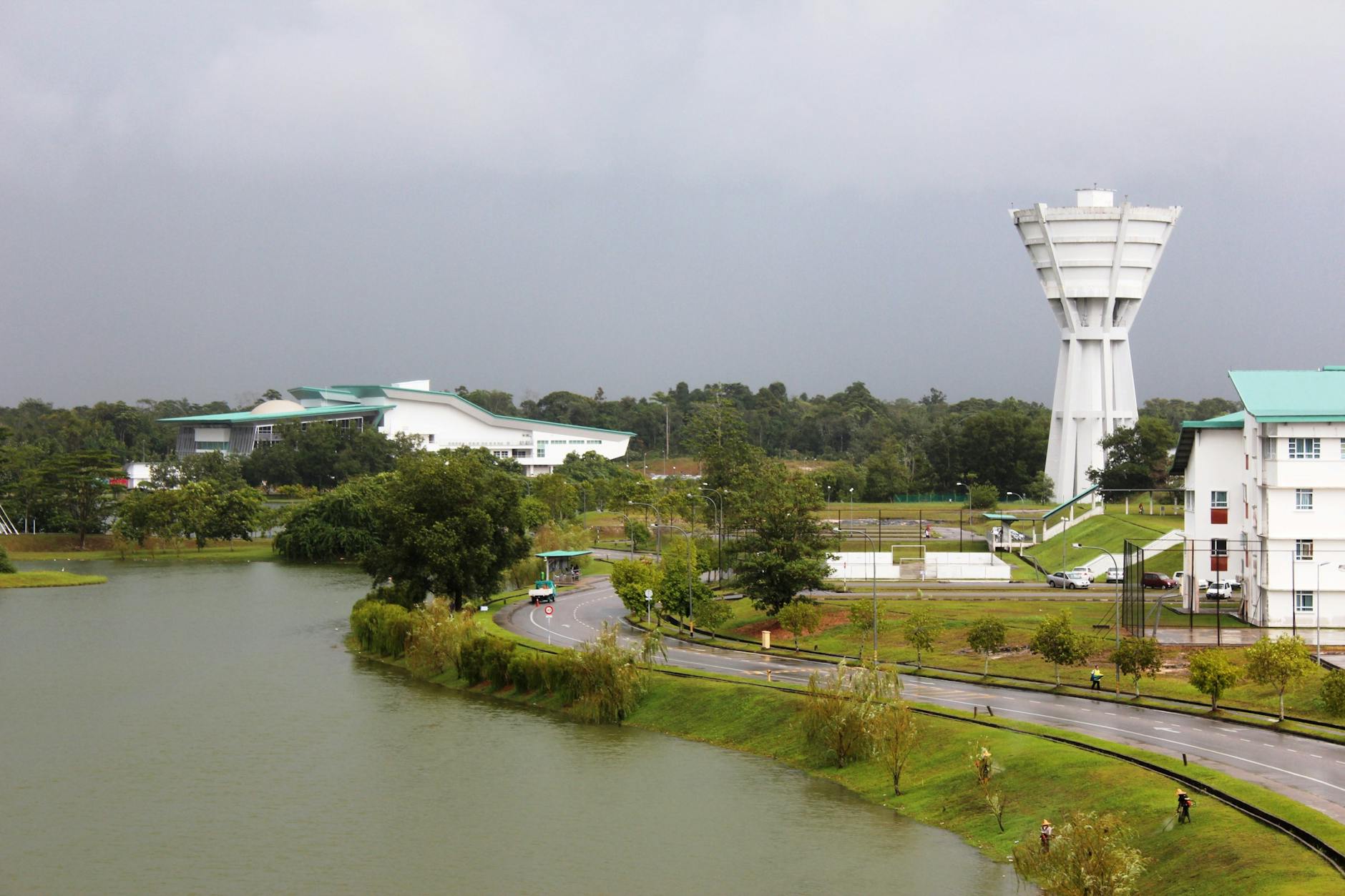 Miri, Sarawak, Malaysia — A beautiful campus with lush greenery and a calm lake in Kota Samarahan, Sarawak, Malaysia.