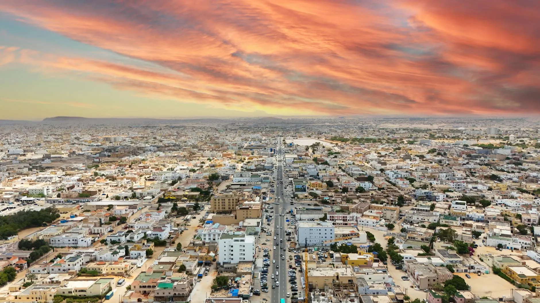 Nouakchott Mauritania — Stunning aerial view of Nouakchott, Mauritania, with vibrant sunset skies and expansive urban landscape.