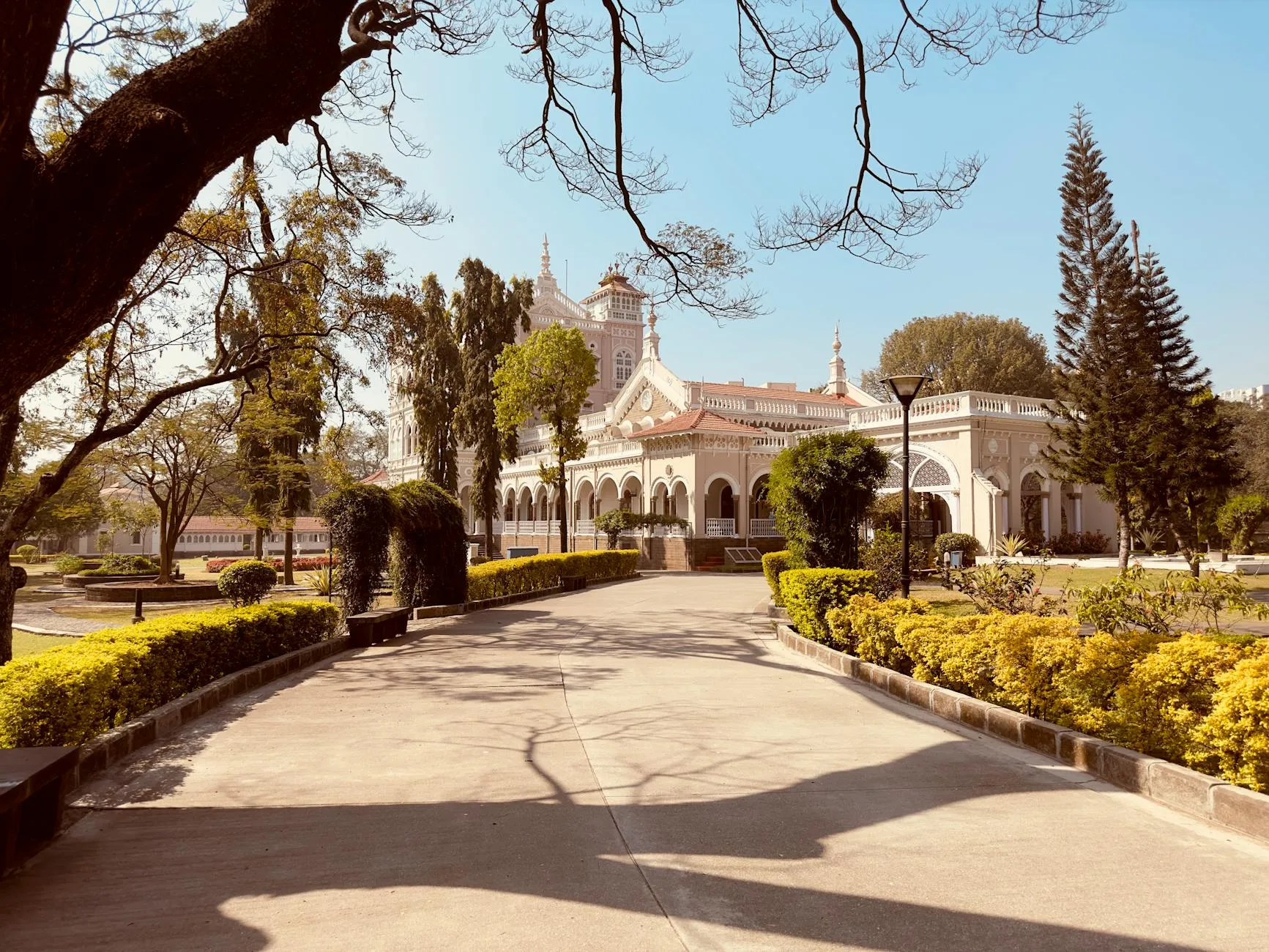 Pune, India — Beautiful palace surrounded by gardens in Pune, Maharashtra, India on a sunny day.