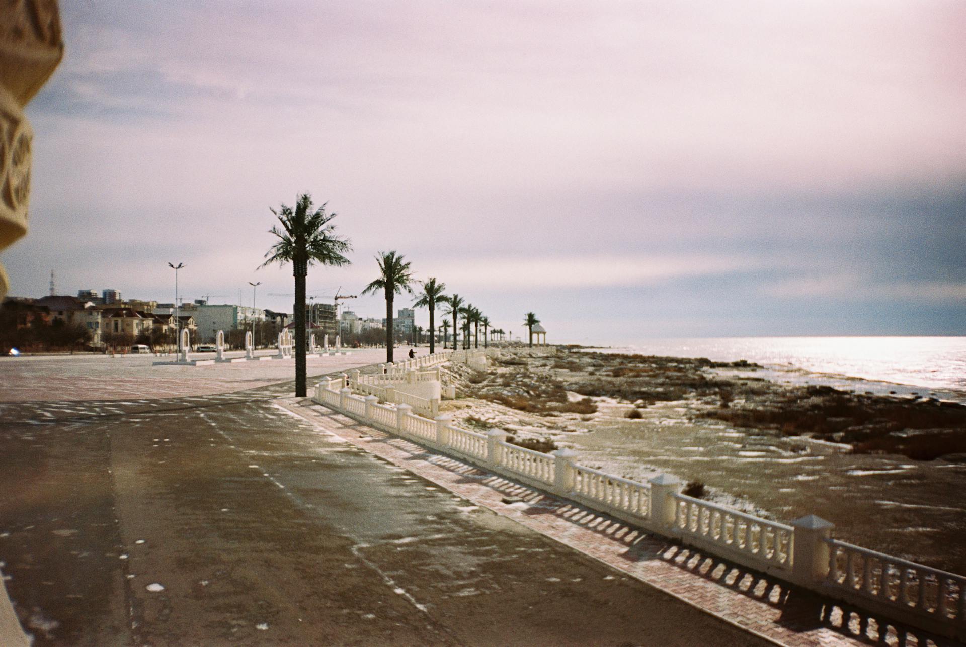 Aktau Kazakhstan — Caspian Sea promenade with palm trees