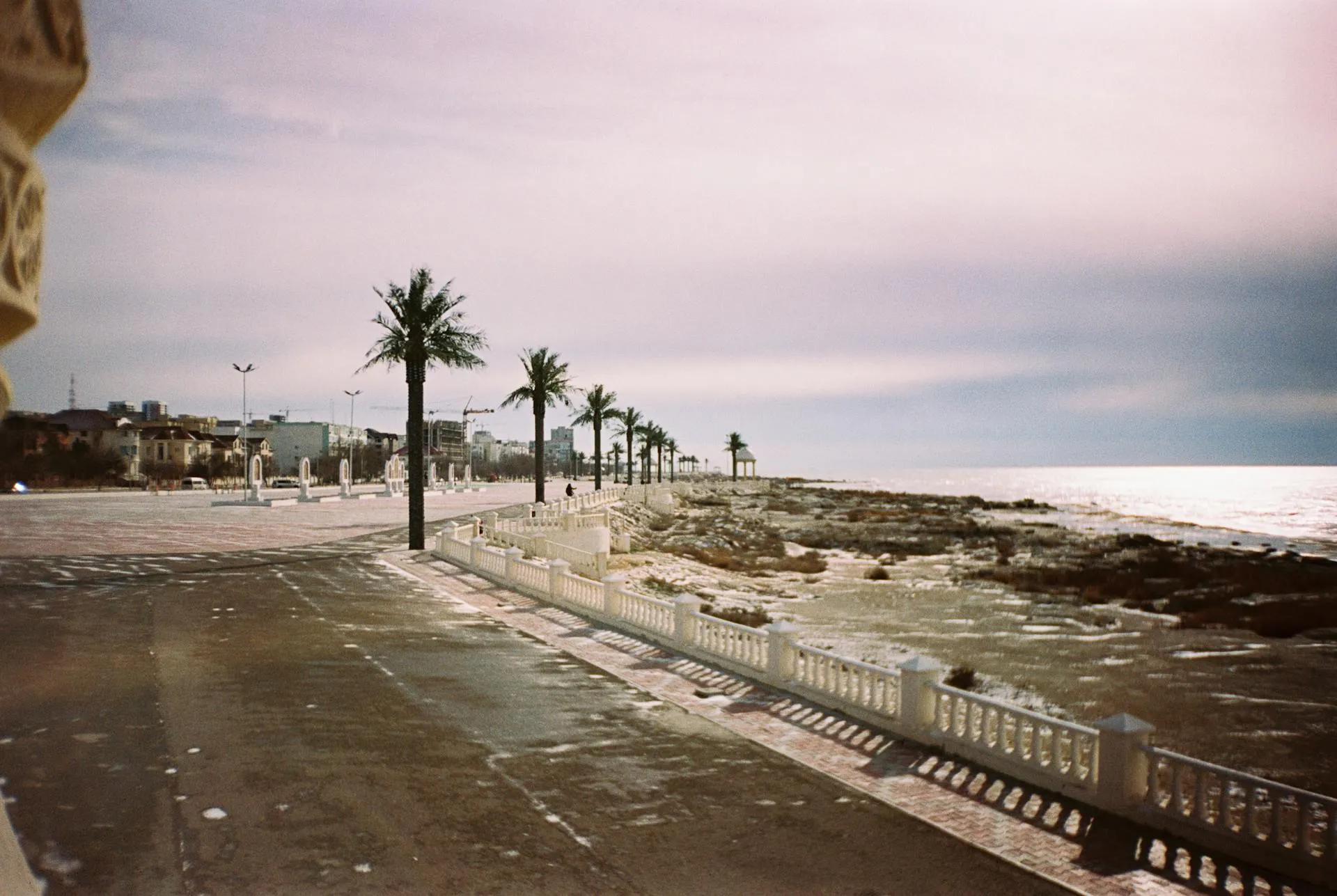 Aktau Kazakhstan — Caspian Sea promenade with palm trees