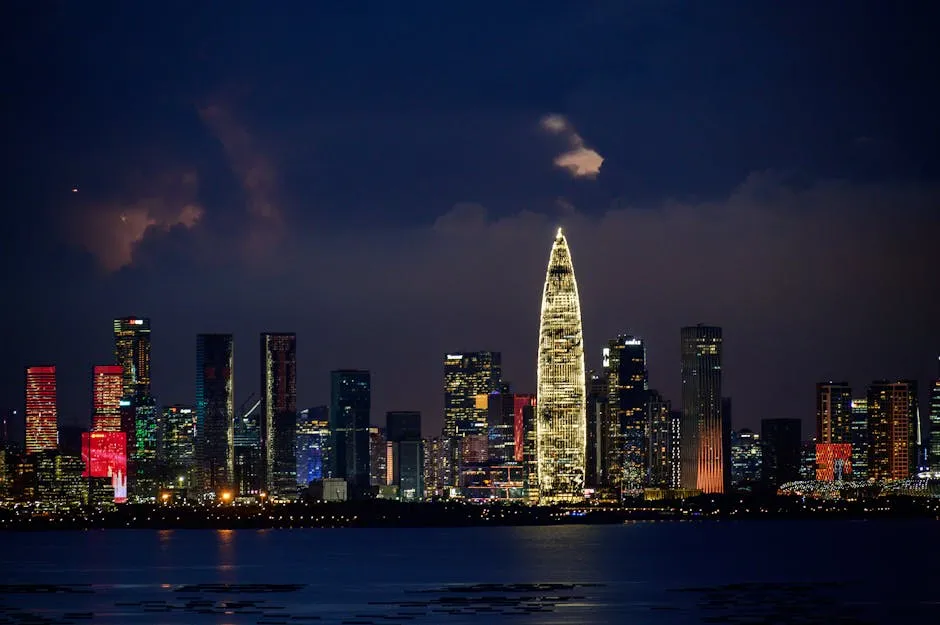 A breathtaking cityscape at night, showcasing illuminated skyscrapers and a vibrant skyline.