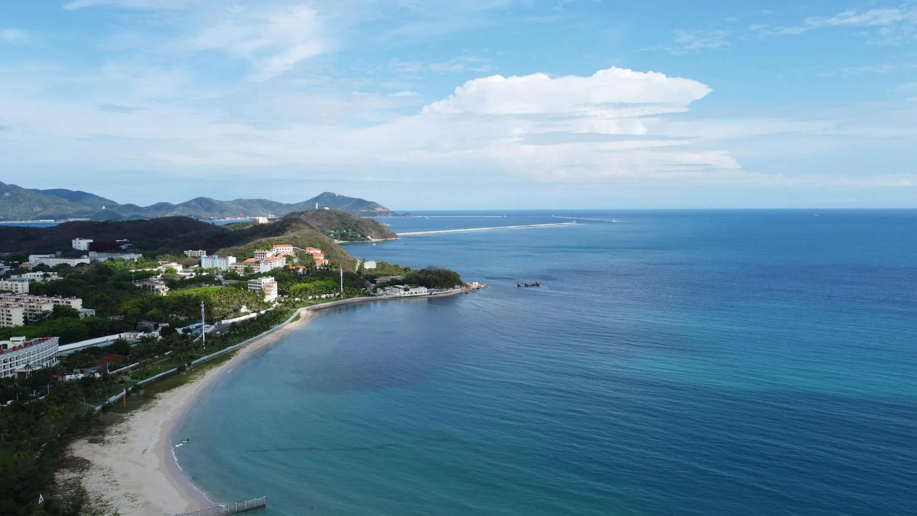Sanya Hainan — Explore the scenic coastal beauty of Sanya, Hainan with its sandy beaches and lush greenery.