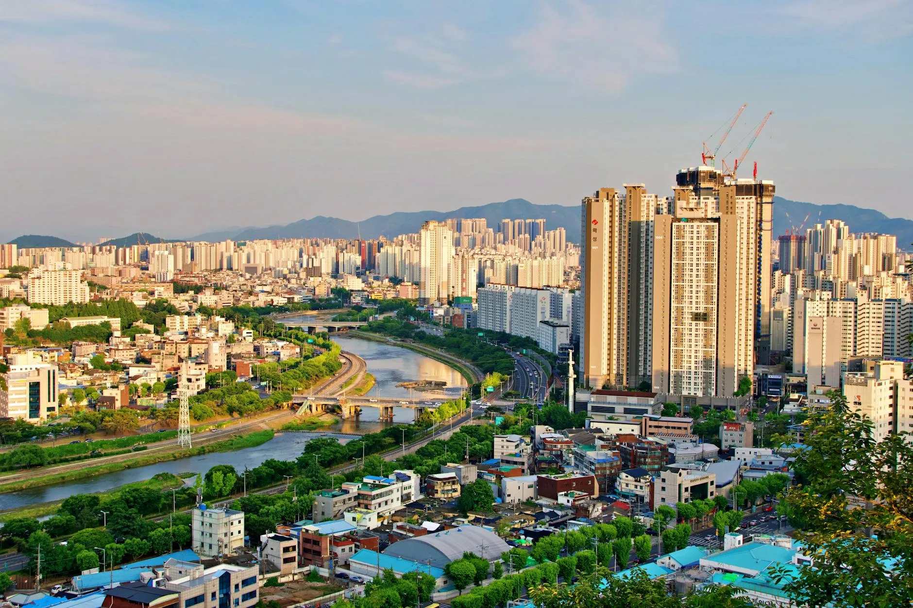 Daegu, South Korea — Explore the bustling skyline of Daegu, South Korea, featuring modern architecture and lush greenery.