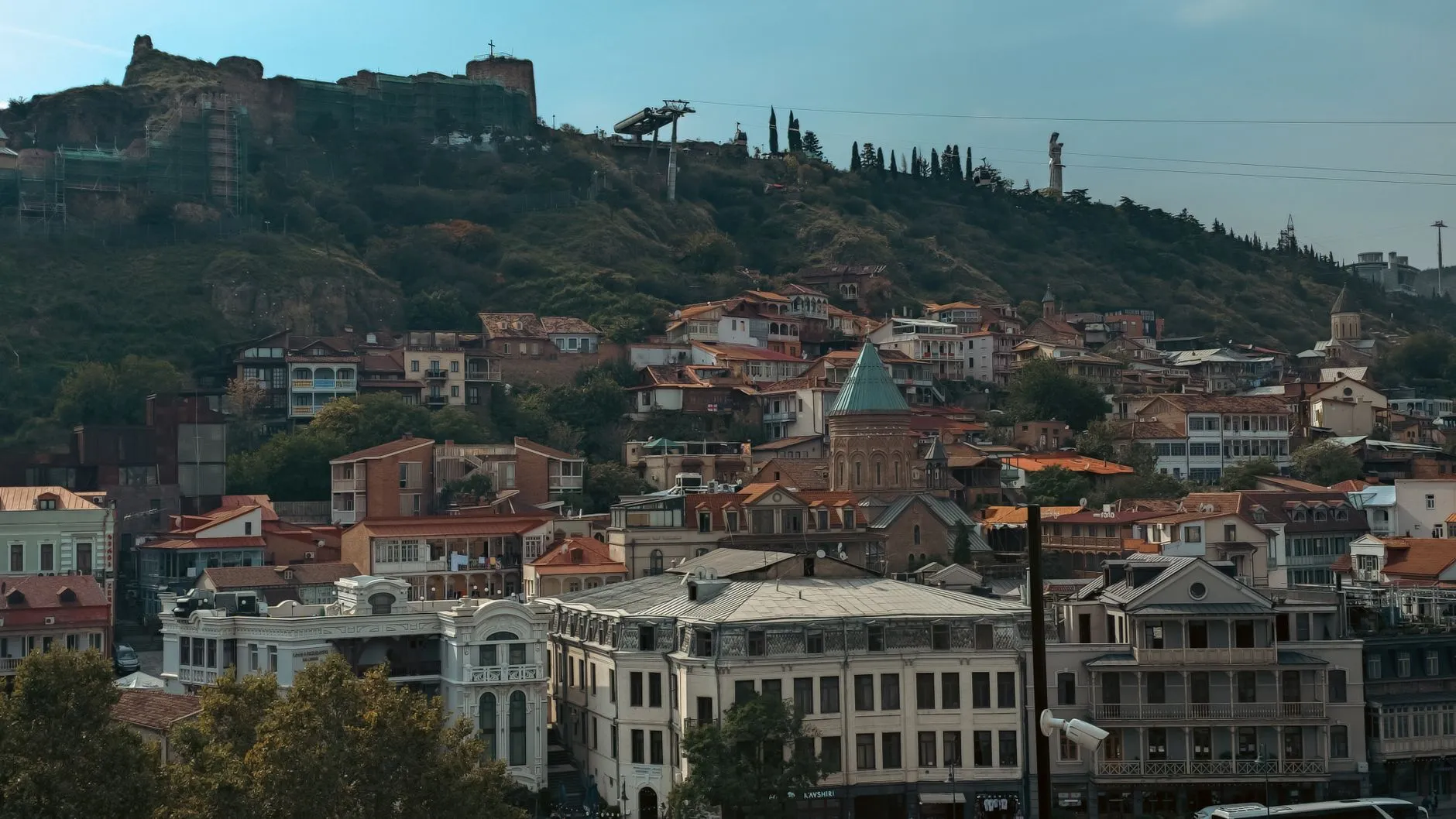 Shota Rustaveli Tbilisi International Airport (TBS) — Explore the charming architecture of Tbilisi's Old Town with its historic buildings and scenic hilltop views.
