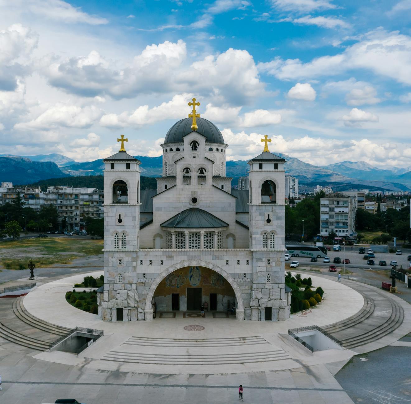 Podgorica Airport (TGD) — Stunning view of an Orthodox cathedral in Podgorica, Montenegro under a cloudy sky.