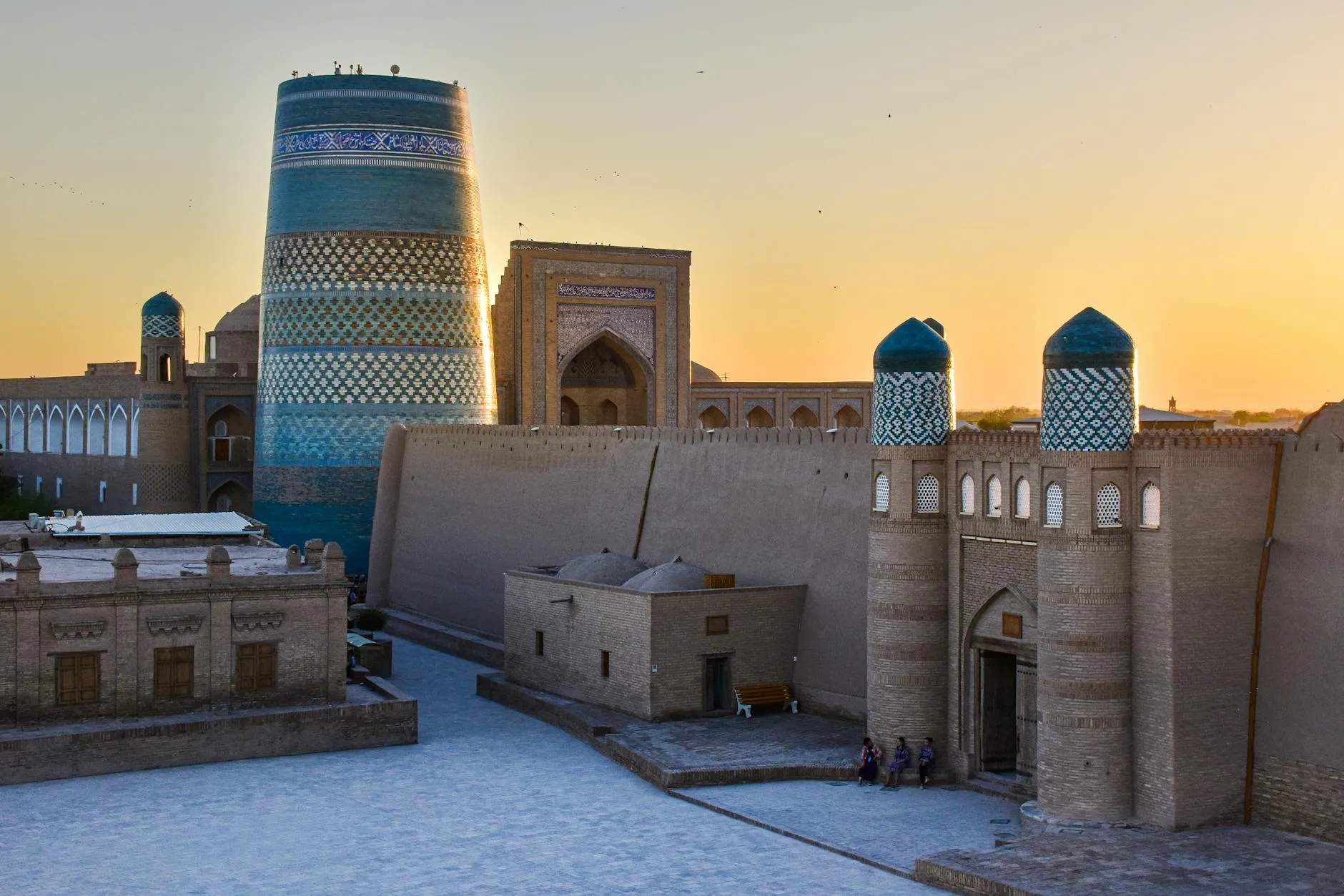 Khiva, Uzbekistan — View of Kalta Minor Minaret in Khiva, Uzbekistan at sunset, highlighting its stunning architecture.