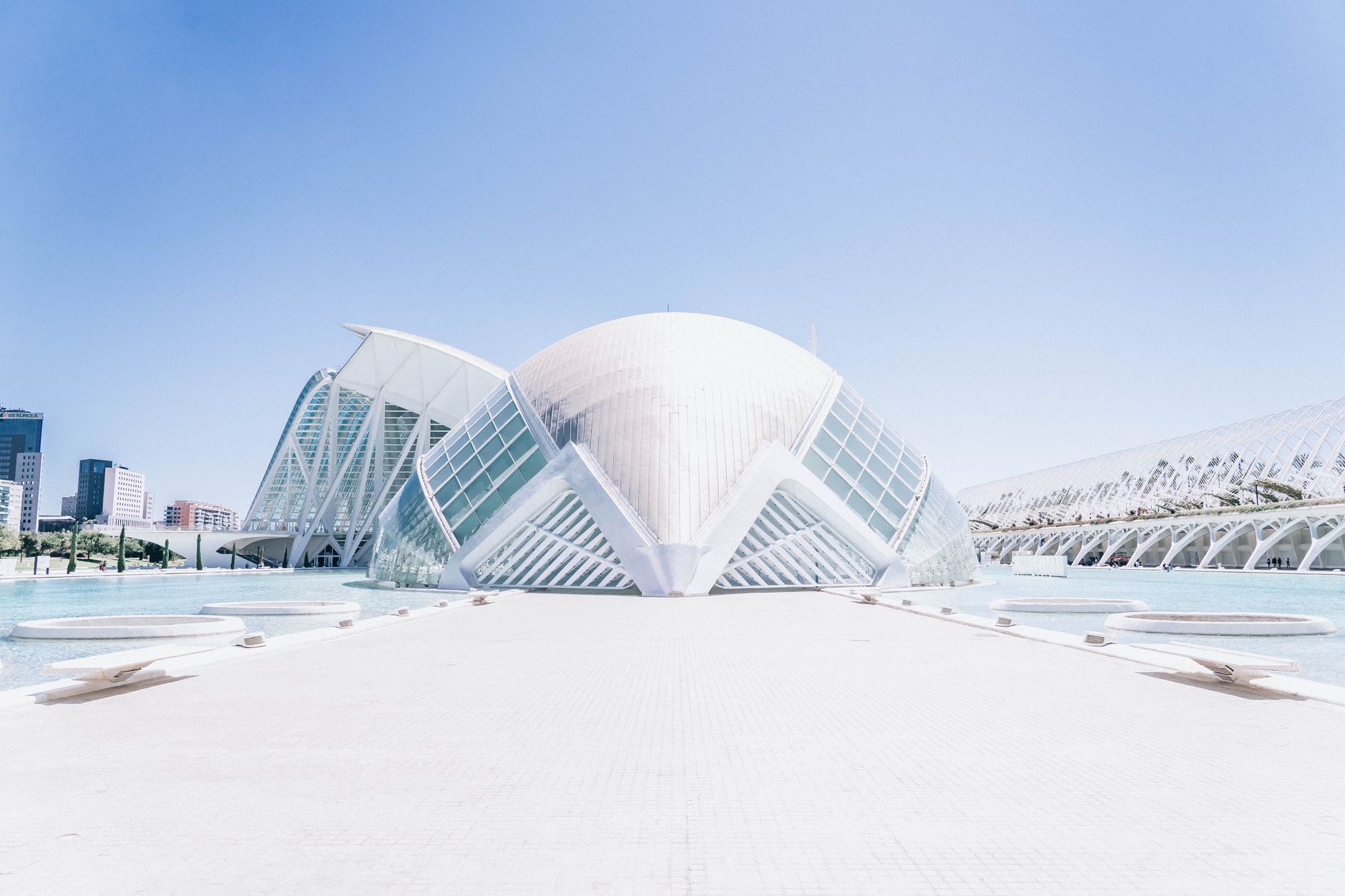 The Costa Blanca — Futuristic architecture of the City of Arts and Sciences in Valencia, Spain, featuring the striking dome structure and clear skies.