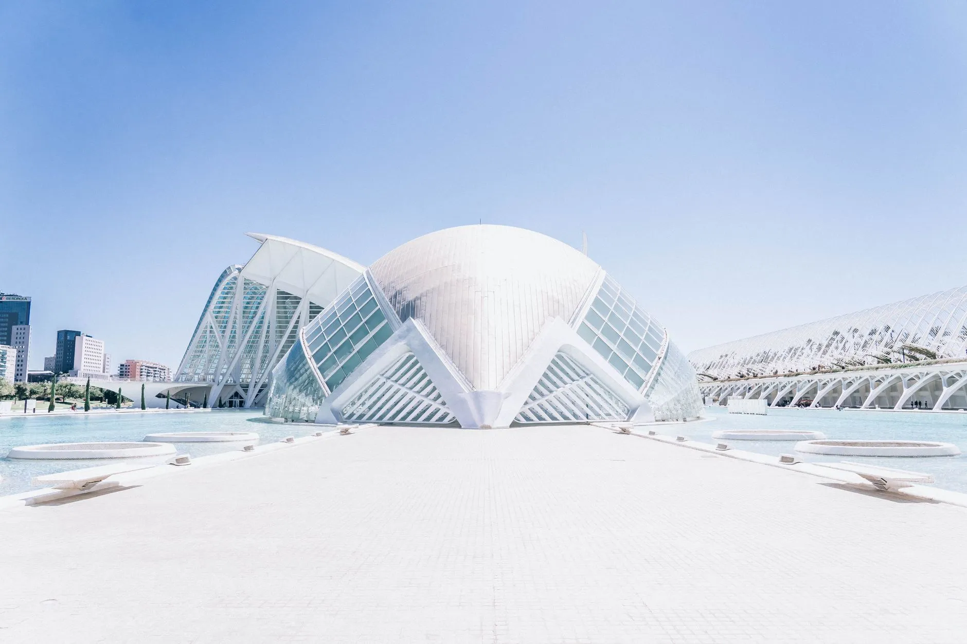The Costa Blanca — Futuristic architecture of the City of Arts and Sciences in Valencia, Spain, featuring the striking dome structure and clear skies.