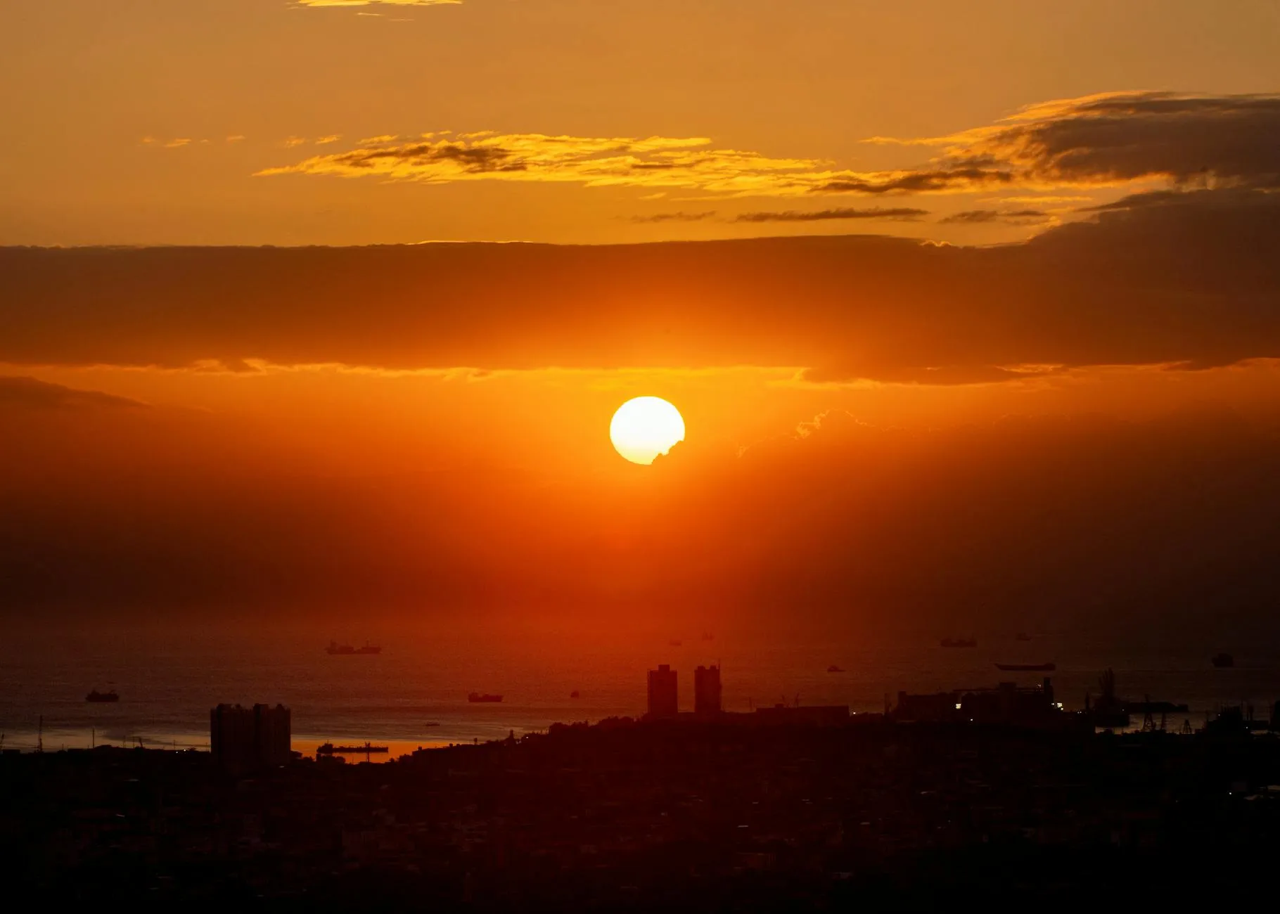 a breathtaking sunset over manila bay with shi