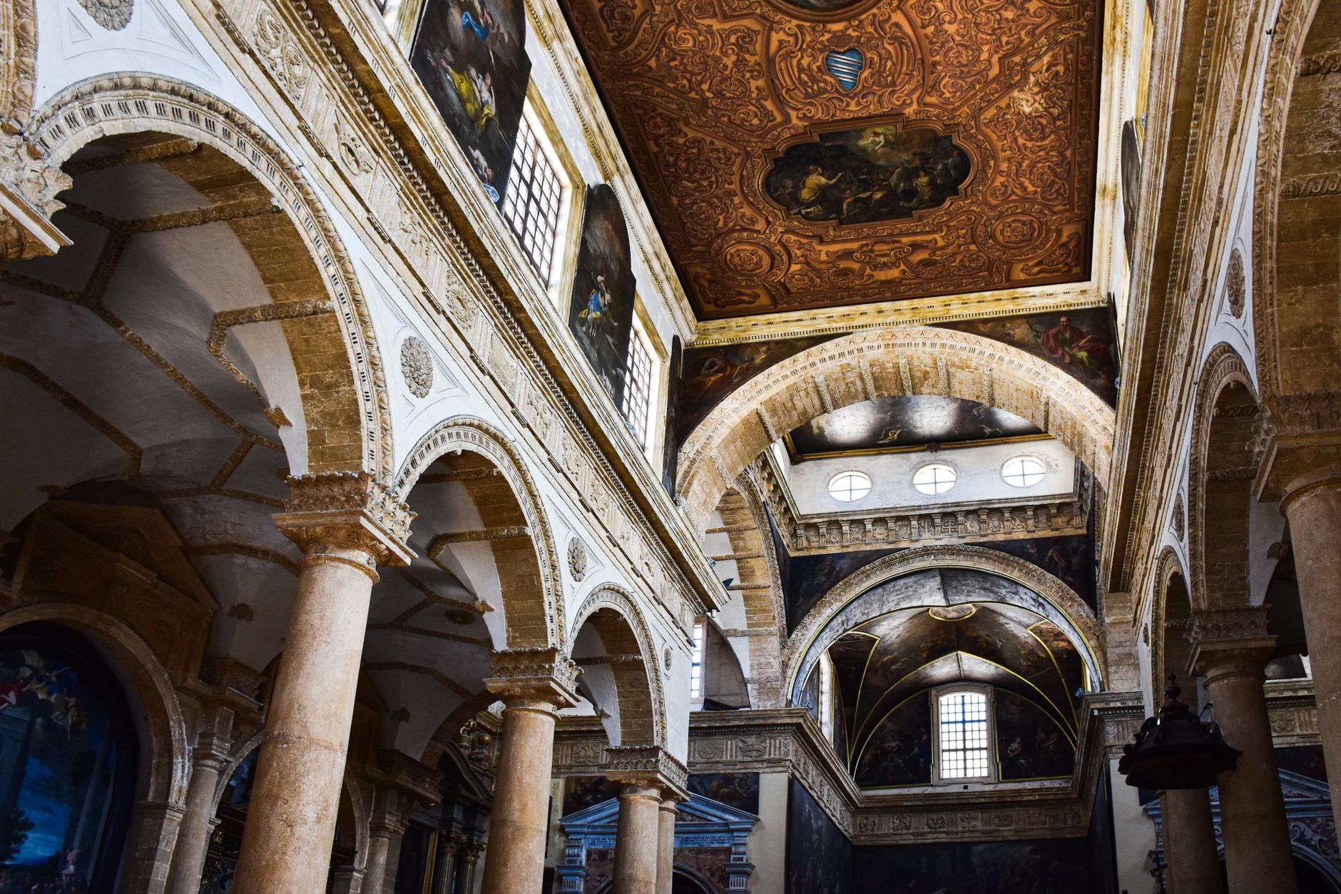 Brindisi / Salento, Puglia — Stunning baroque architecture of Lecce Cathedral's interior in Apulia, showcasing elaborate ceiling and arches.