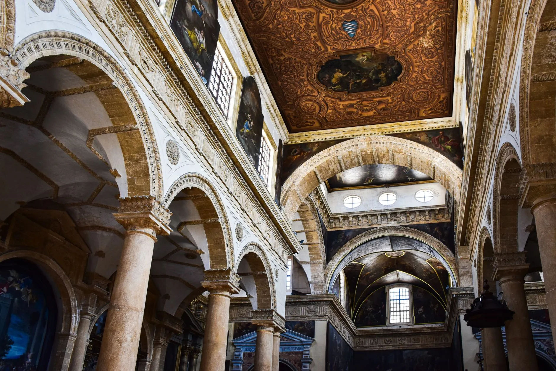 Brindisi / Salento, Puglia — Stunning baroque architecture of Lecce Cathedral's interior in Apulia, showcasing elaborate ceiling and arches.