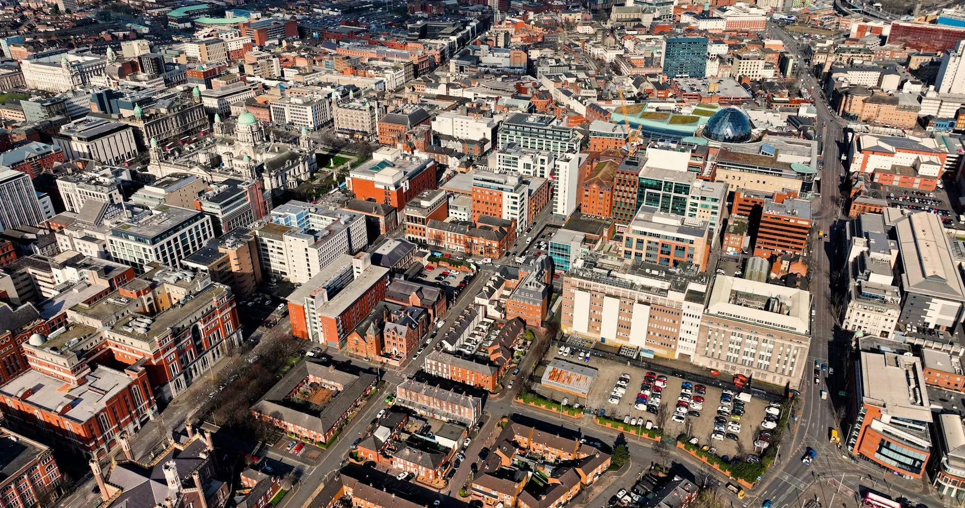 Belfast — Aerial view showcasing the architectural skyline of Belfast city center in Northern Ireland.