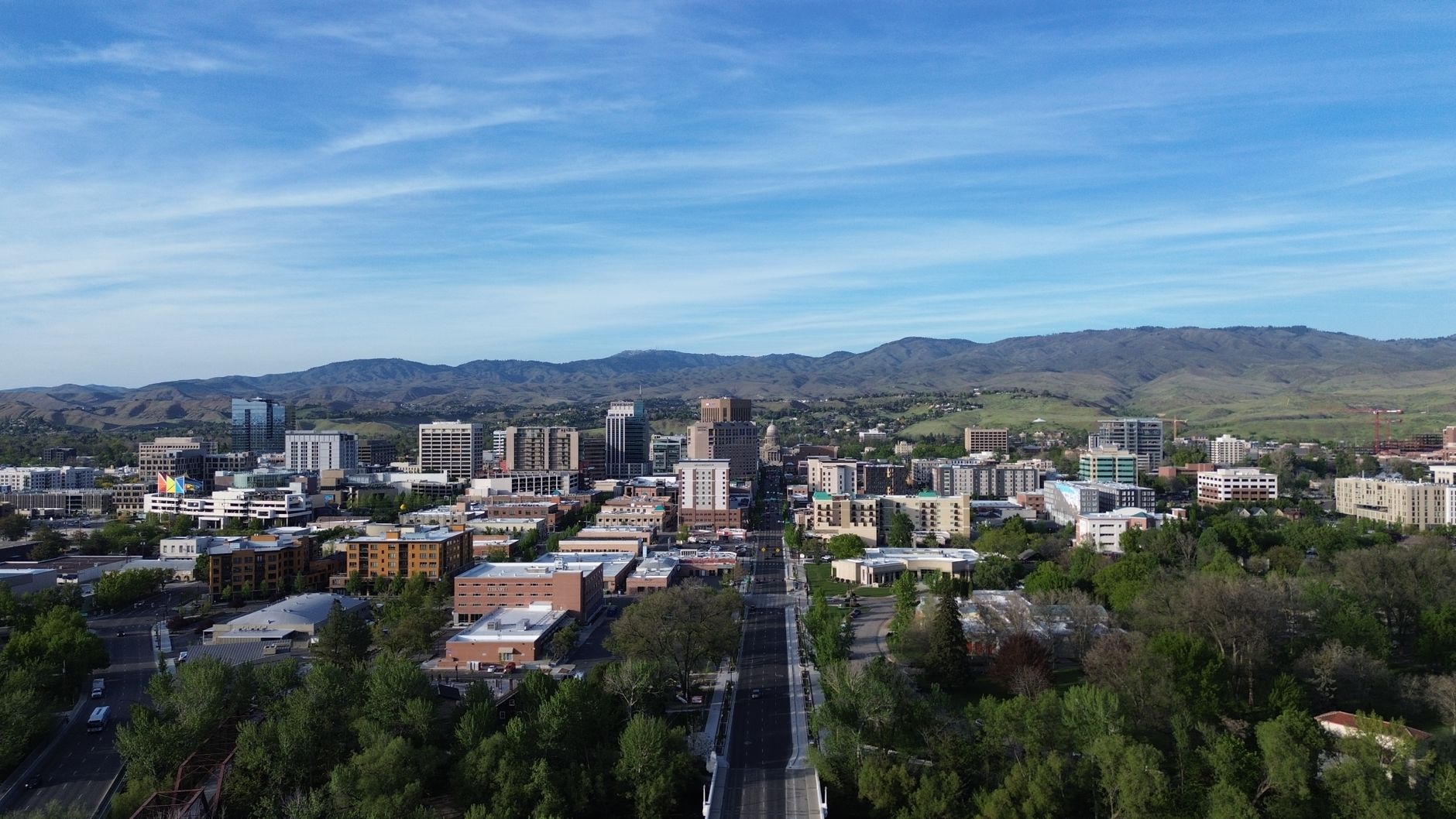 Boise, USA — Stunning aerial capture of Boise, Idaho skyline with mountains in the background.