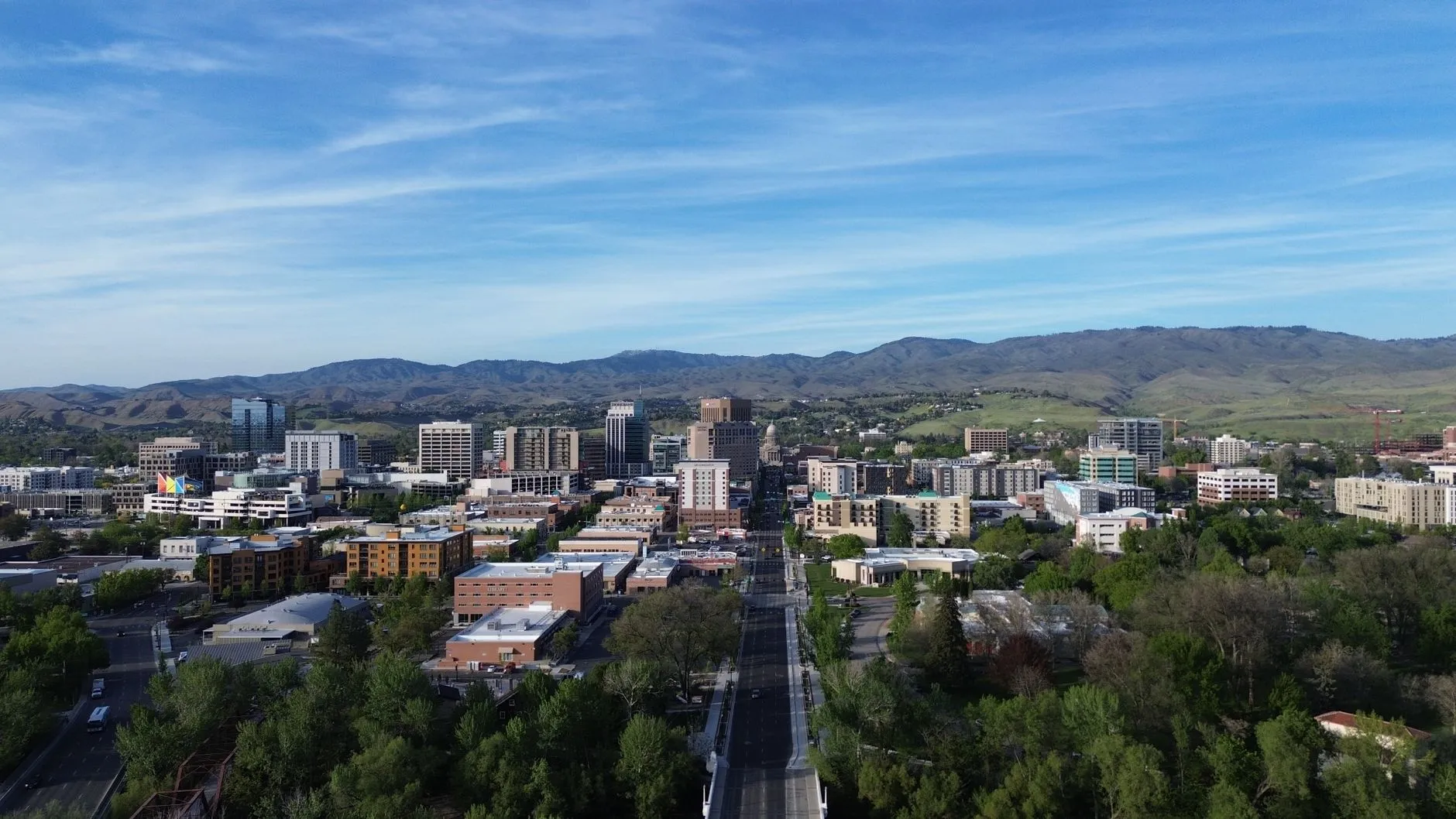 Boise, USA — Stunning aerial capture of Boise, Idaho skyline with mountains in the background.