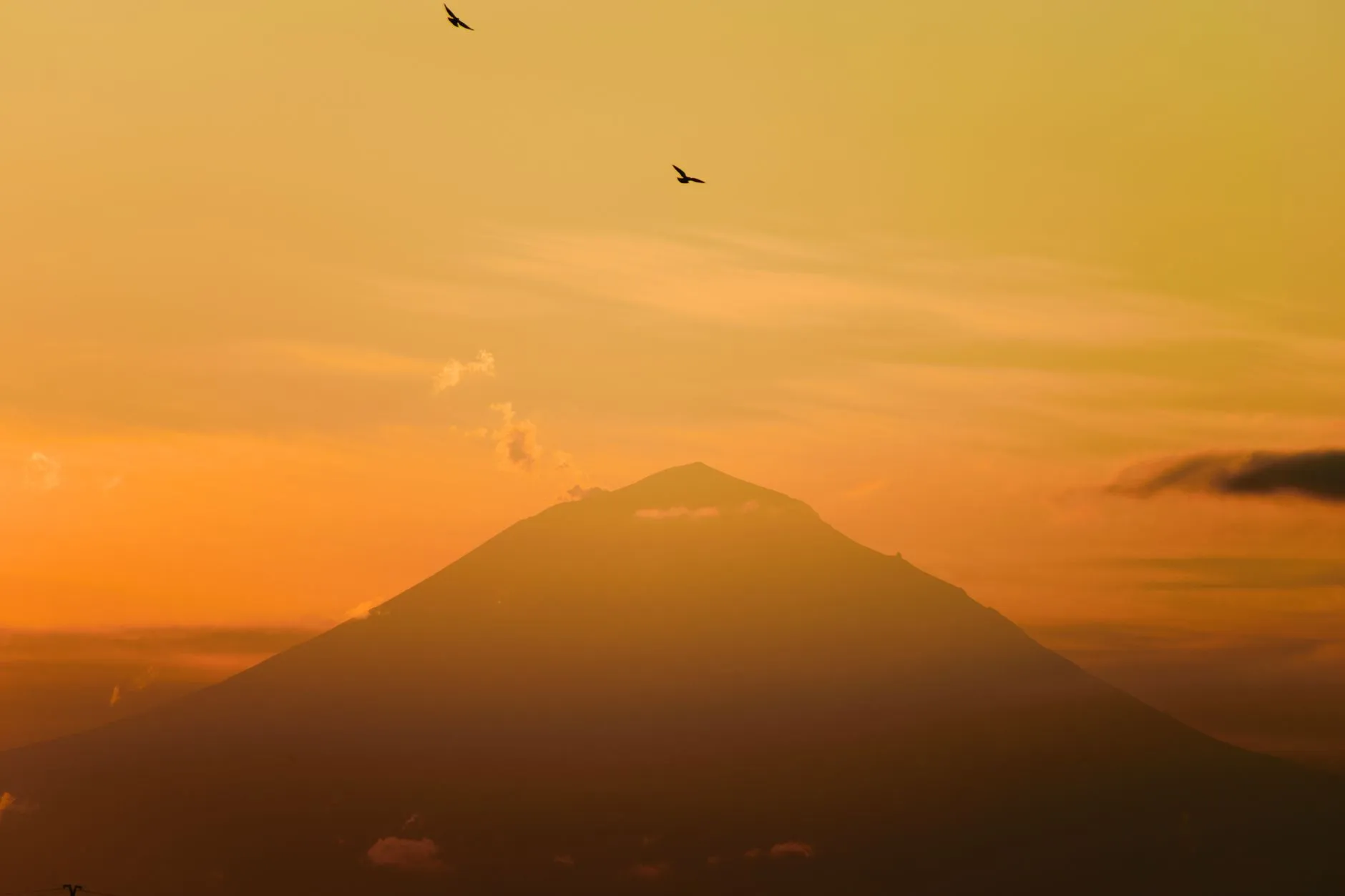 breathtaking sunrise silhouette of mount iztac