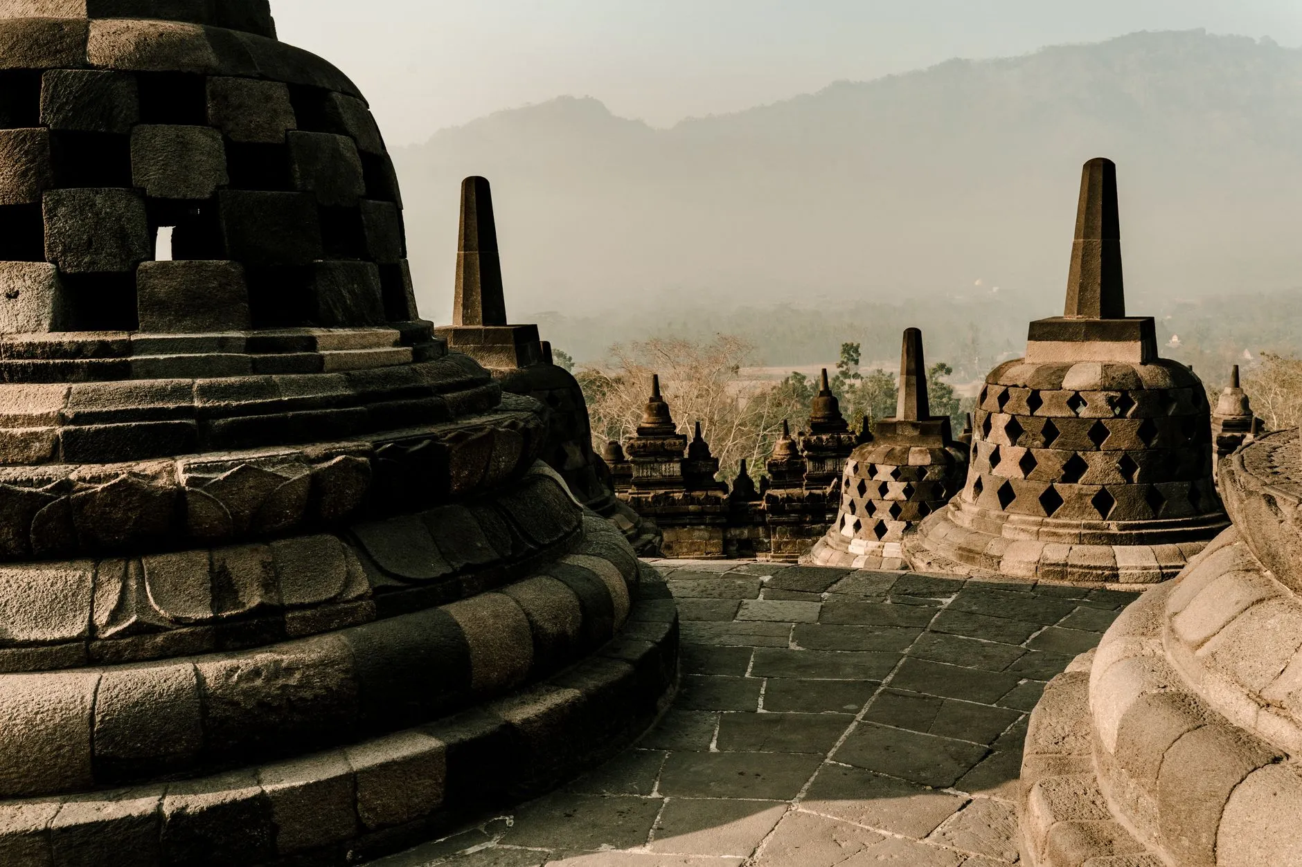 Indonesia — Stunning view of the ancient Borobudur Temple at sunrise in Central Java, Indonesia.
