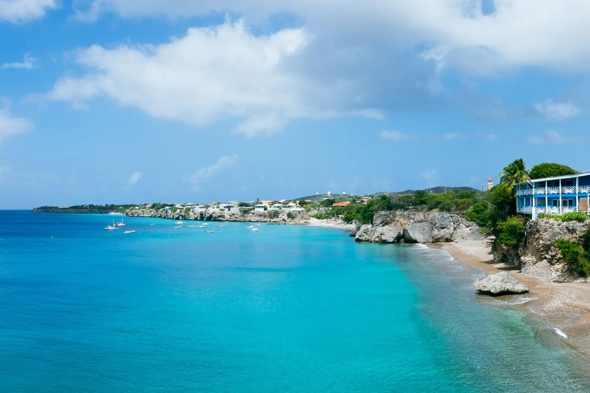 Curaçao — Stunning aerial view of Playa Forti Beach in Curacao with turquoise waters and rocky shorelines.