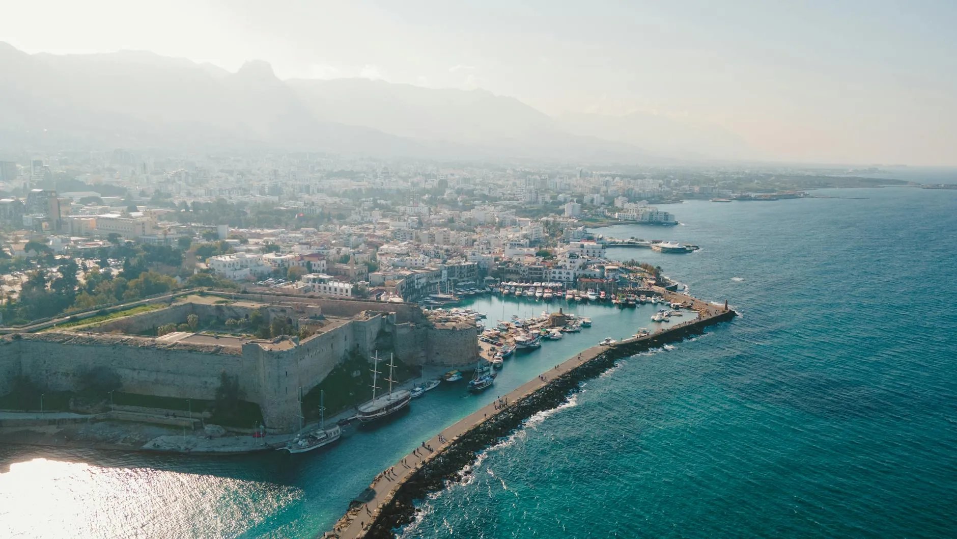 Northern Cyprus — A breathtaking aerial view of Kyrenia Castle and the bustling harbor in Cyprus.