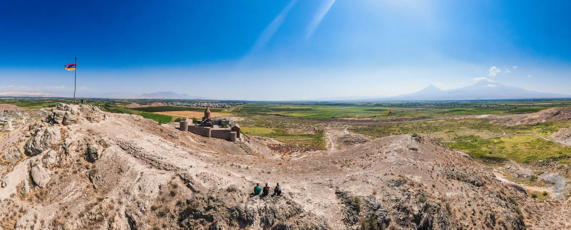 Armenia — Panoramic aerial view of Khor Virap Monastery with Mount Ararat in the background under a blue sky.