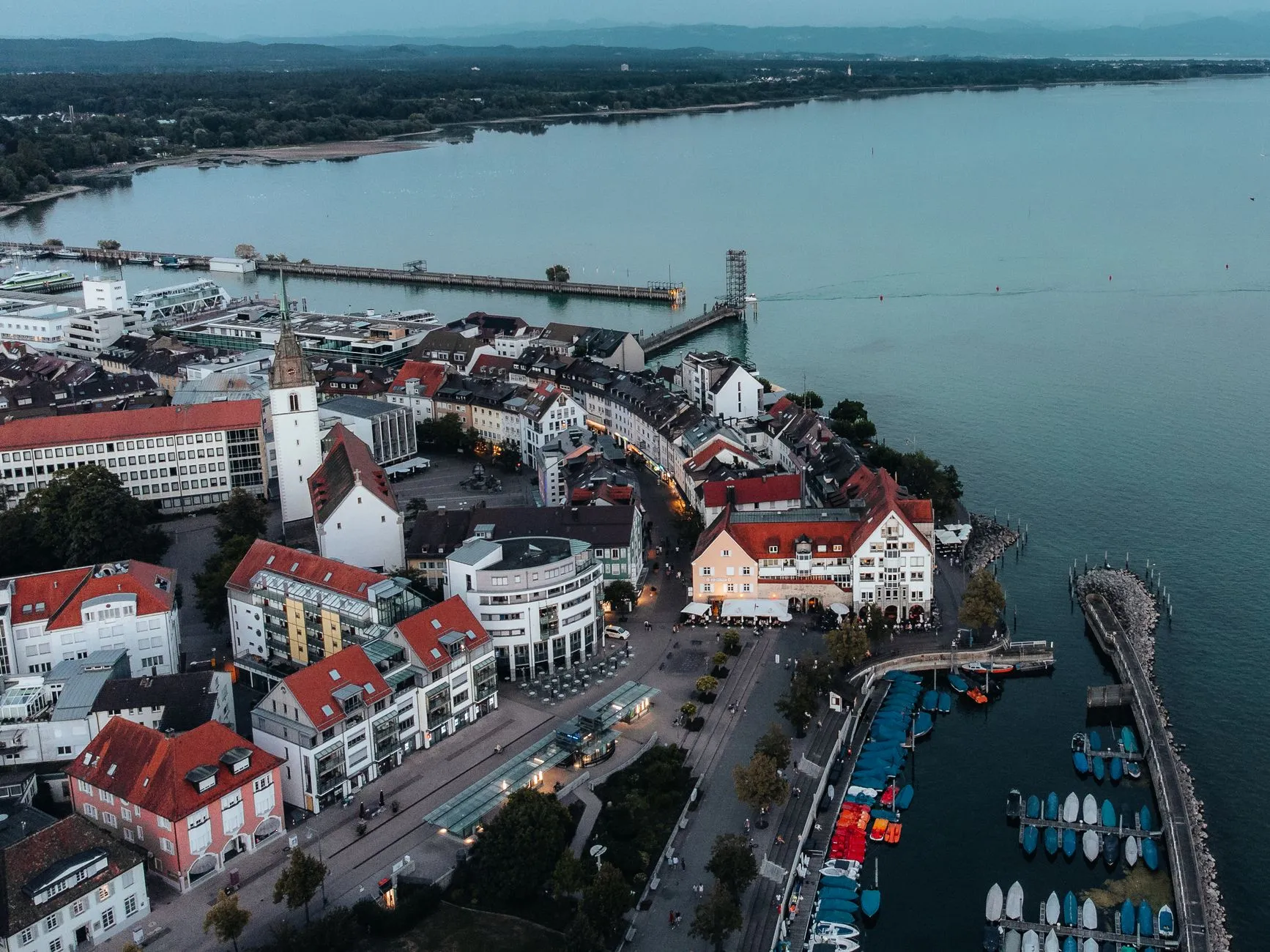 Friedrichshafen / Lake Constance — Scenic aerial view of Friedrichshafen, Germany with Lake Constance at dusk.
