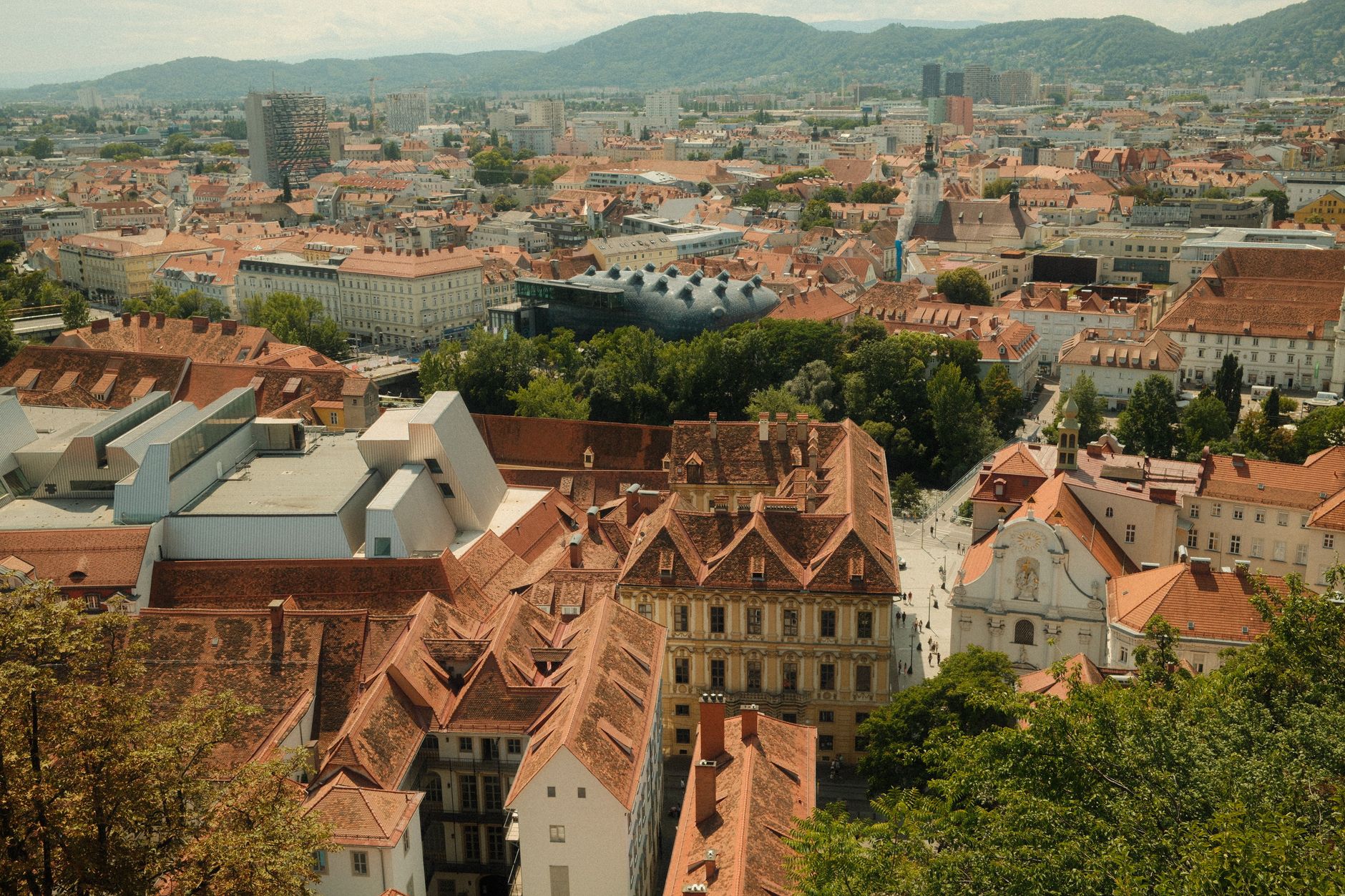 Graz, Austria — Stunning aerial view of Graz, featuring historic buildings and modern architecture in sunny Styria, Austria.
