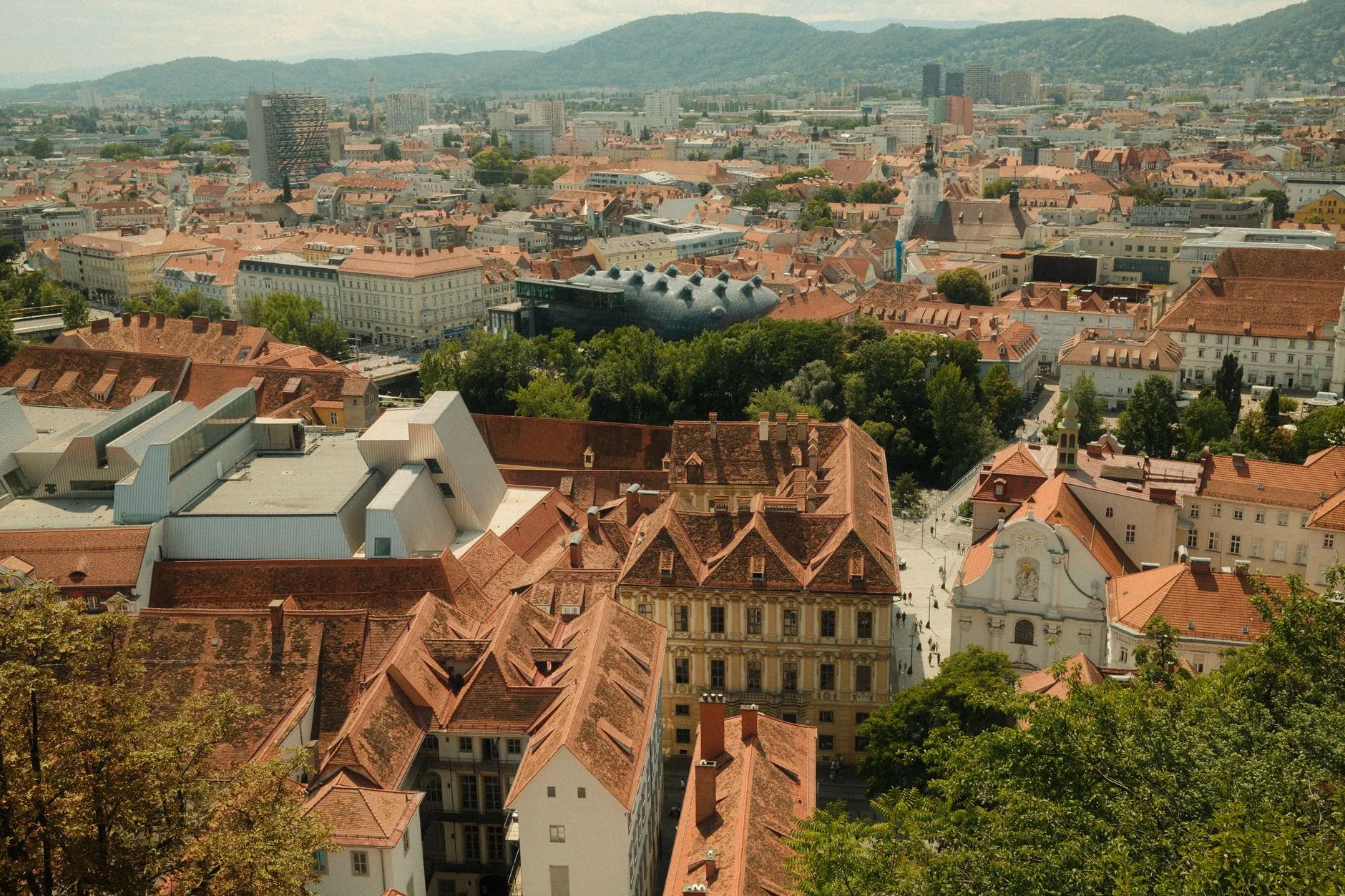 Graz, Austria — Stunning aerial view of Graz, featuring historic buildings and modern architecture in sunny Styria, Austria.
