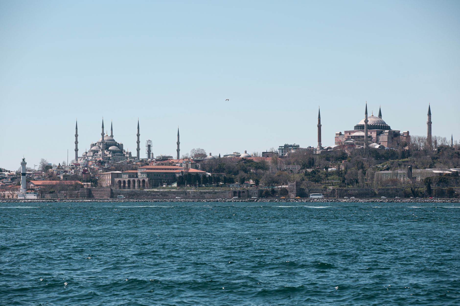 Türkiye (Turkey) — Scenic view of Istanbul's iconic Blue Mosque and Hagia Sophia across the Bosphorus.
