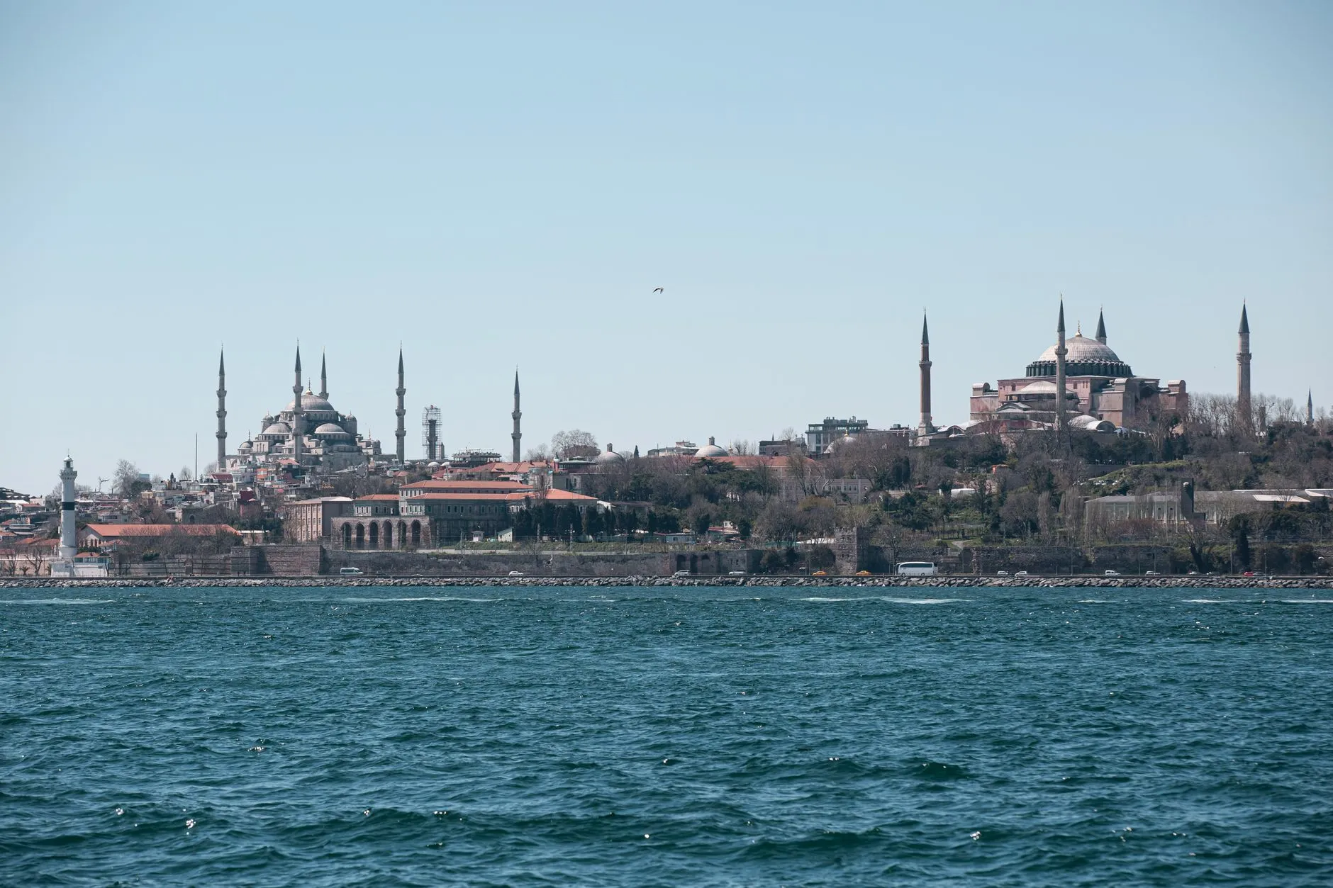 Türkiye (Turkey) — Scenic view of Istanbul's iconic Blue Mosque and Hagia Sophia across the Bosphorus.