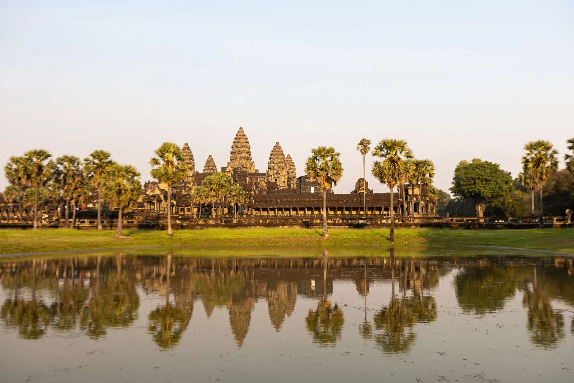 Cambodia — Angkor Wat temple with reflection in tranquil water during daylight in Cambodia.
