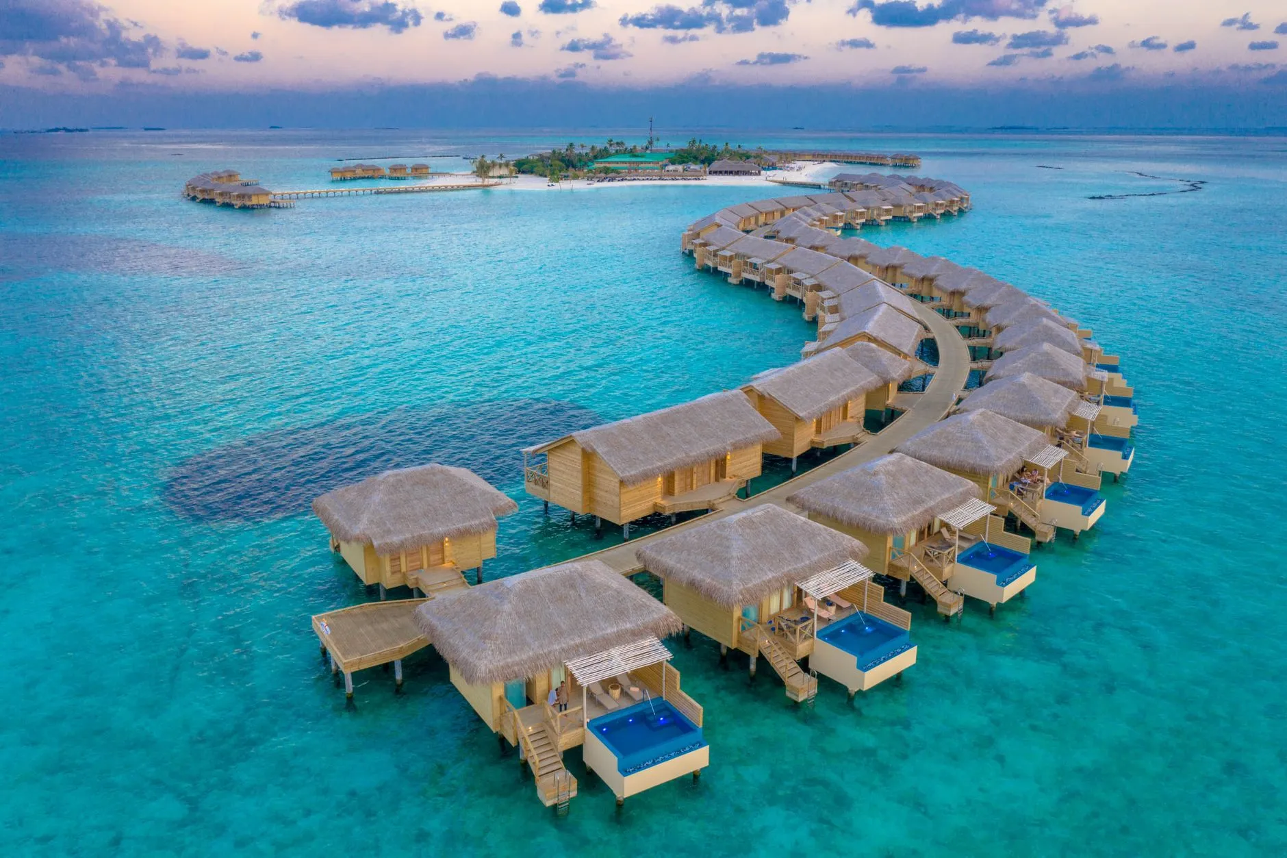 Maldives — overwater villas and turquoise lagoon