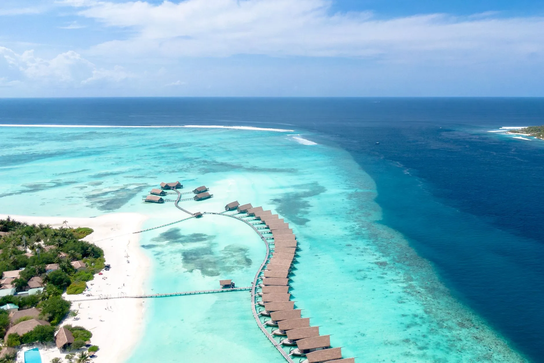 Maldives — overwater villas and turquoise lagoon