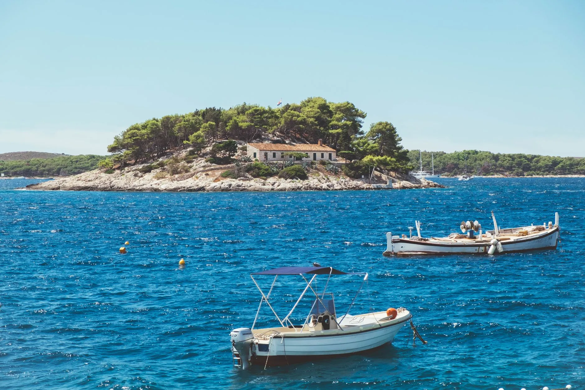 The Dalmatian Coast — Charming island view with boats in the Adriatic Sea near Hvar, Croatia.