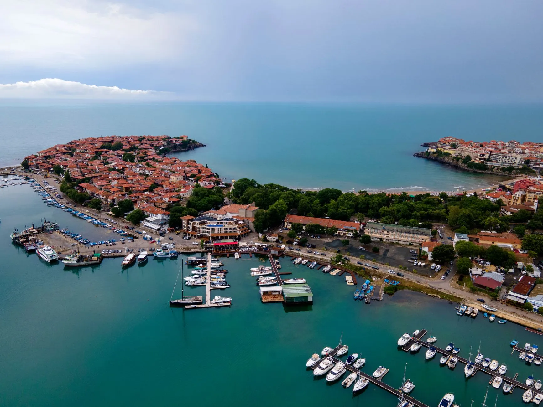The Bulgarian Black Sea Coast — A captivating aerial shot of Sozopol's marina and historic old town on the Black Sea coast of Bulgaria.