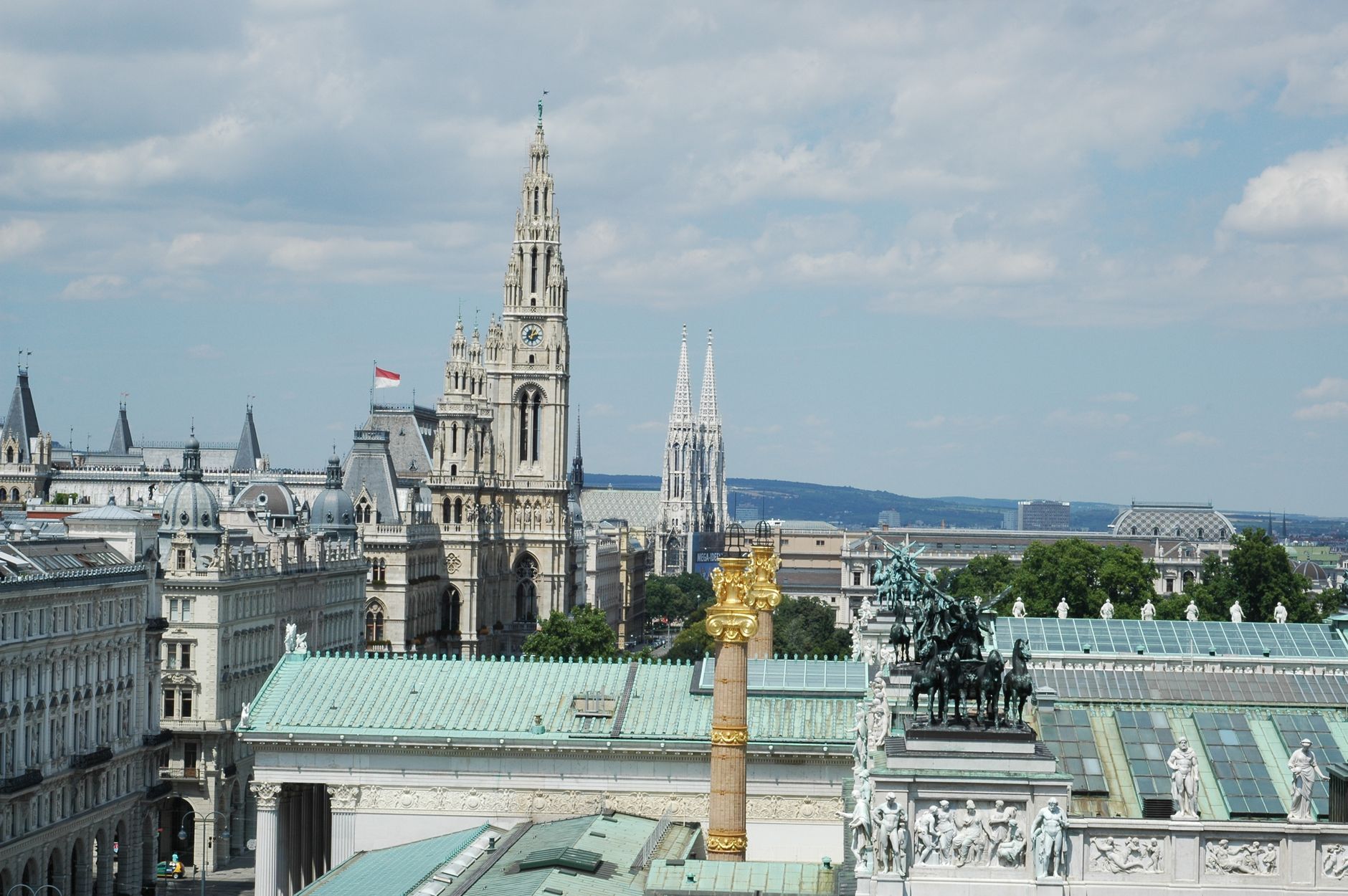 Vienna — historic skyline with the Rathaus and Votivkirche